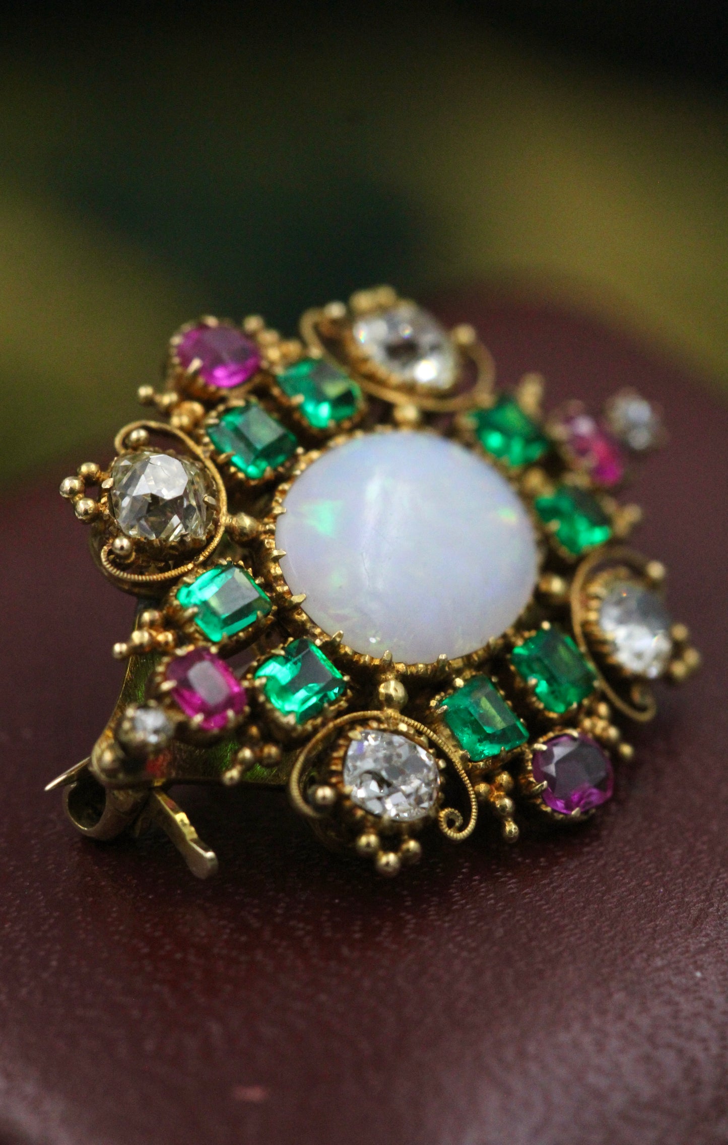 A very finely worked Opal, Colombian Emerald, Burmese Ruby & Diamond, 18ct Yellow Gold Brooch, attributed to Harvey & Gore. Circa 1890. - Robin Haydock Antiques