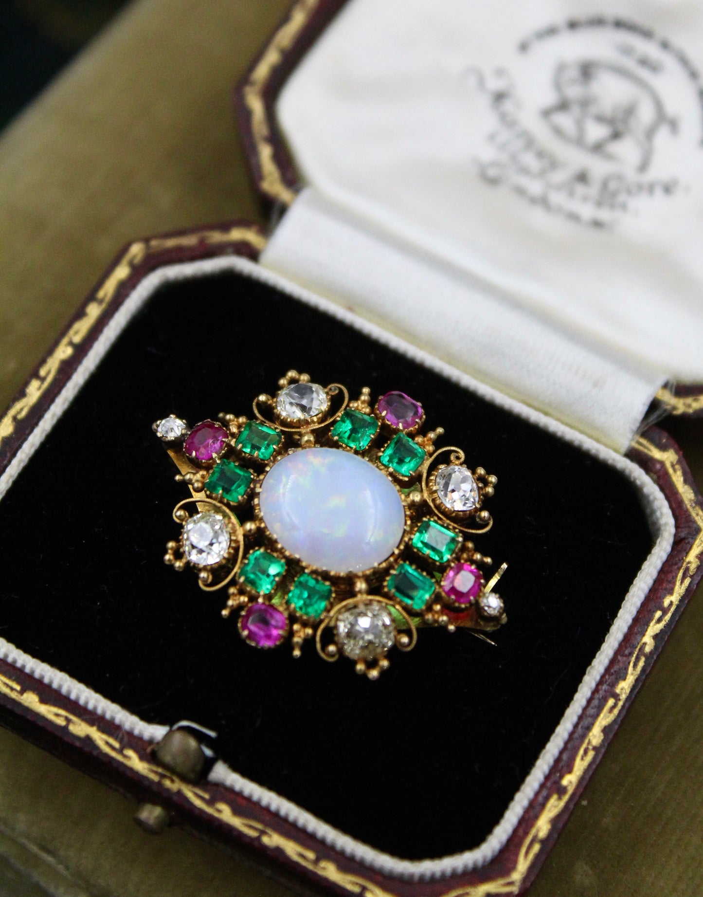 A very finely worked Opal, Colombian Emerald, Burmese Ruby & Diamond, 18ct Yellow Gold Brooch, attributed to Harvey & Gore. Circa 1890. - Robin Haydock Antiques