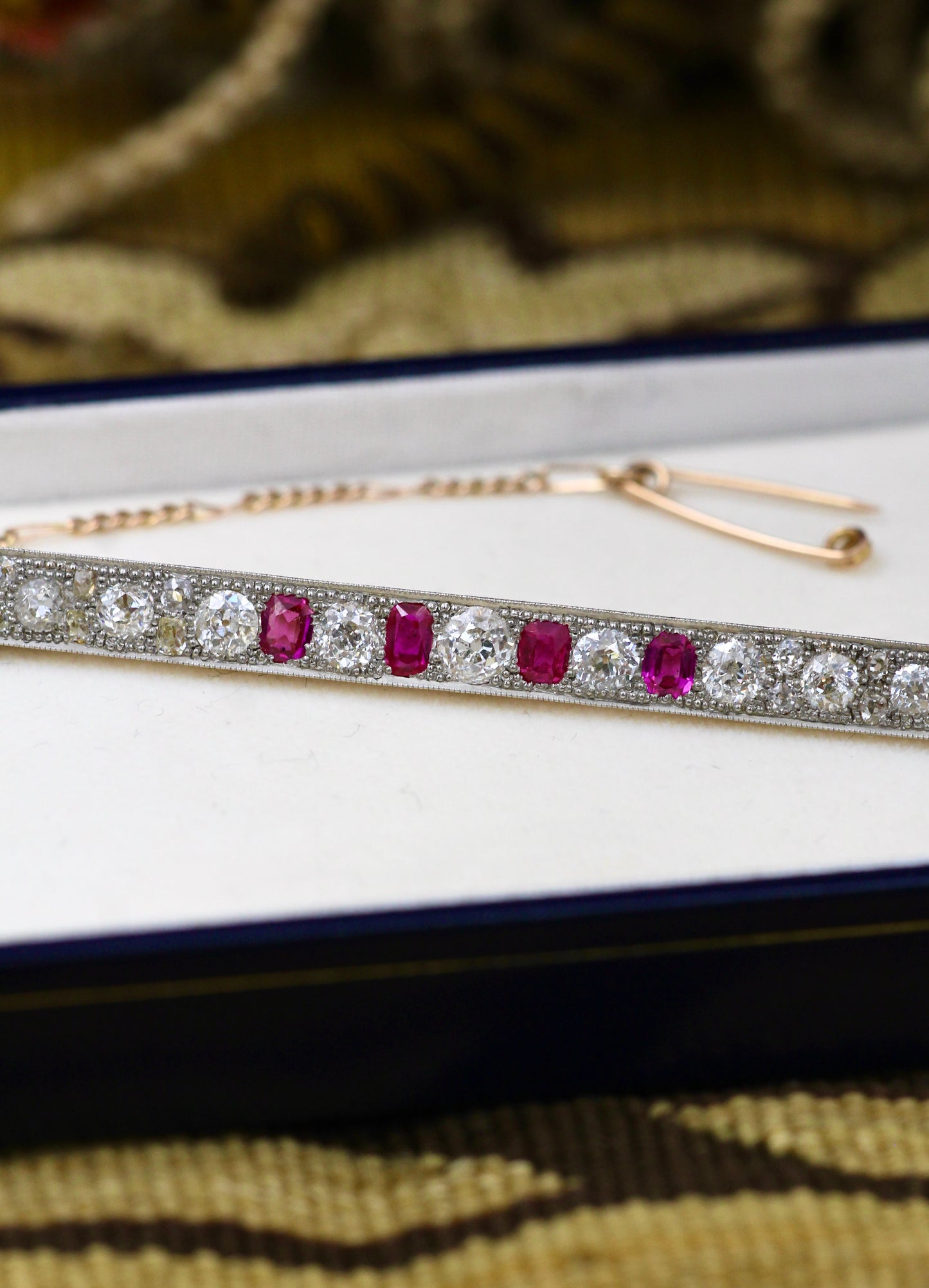 A very fine Edwardian Ruby and Diamond Brooch with four Natural Burma Rubies weighing 0.80 carats (total) with no indication of heat treatment. - Robin Haydock Antiques