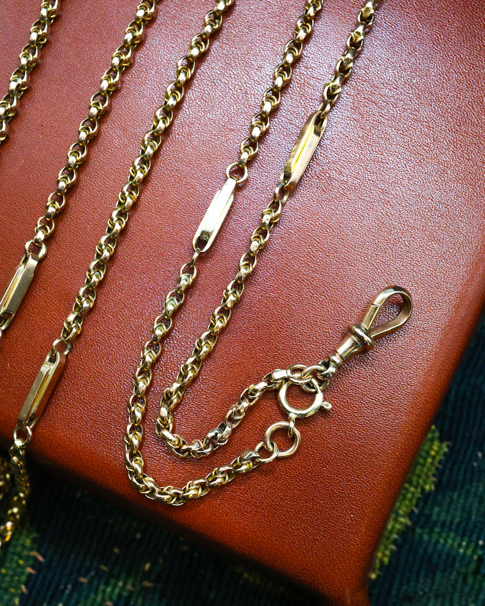 A very fine Antique 9 Carat "Opera Length" Yellow Gold, Long Guard Chain, with intermittent double oblong links and a Lobster Claw Clasp. English. Circa 1890. - Robin Haydock Antique Jewellery