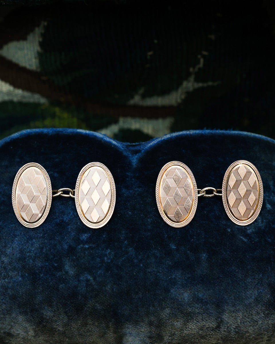 A fine pair of Antique 9 carat Yellow Gold Oval Cuff Links with an engine turned Art Deco design. English Circa 1929 - Robin Haydock Antique Jewellery