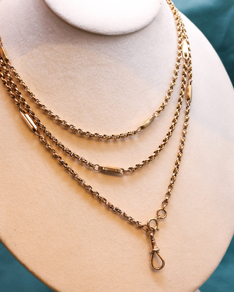 A very fine Antique 9 Carat "Opera Length" Yellow Gold, Long Guard Chain, with intermittent double oblong links and a Lobster Claw Clasp. English. Circa 1890. - Robin Haydock Antique Jewellery
