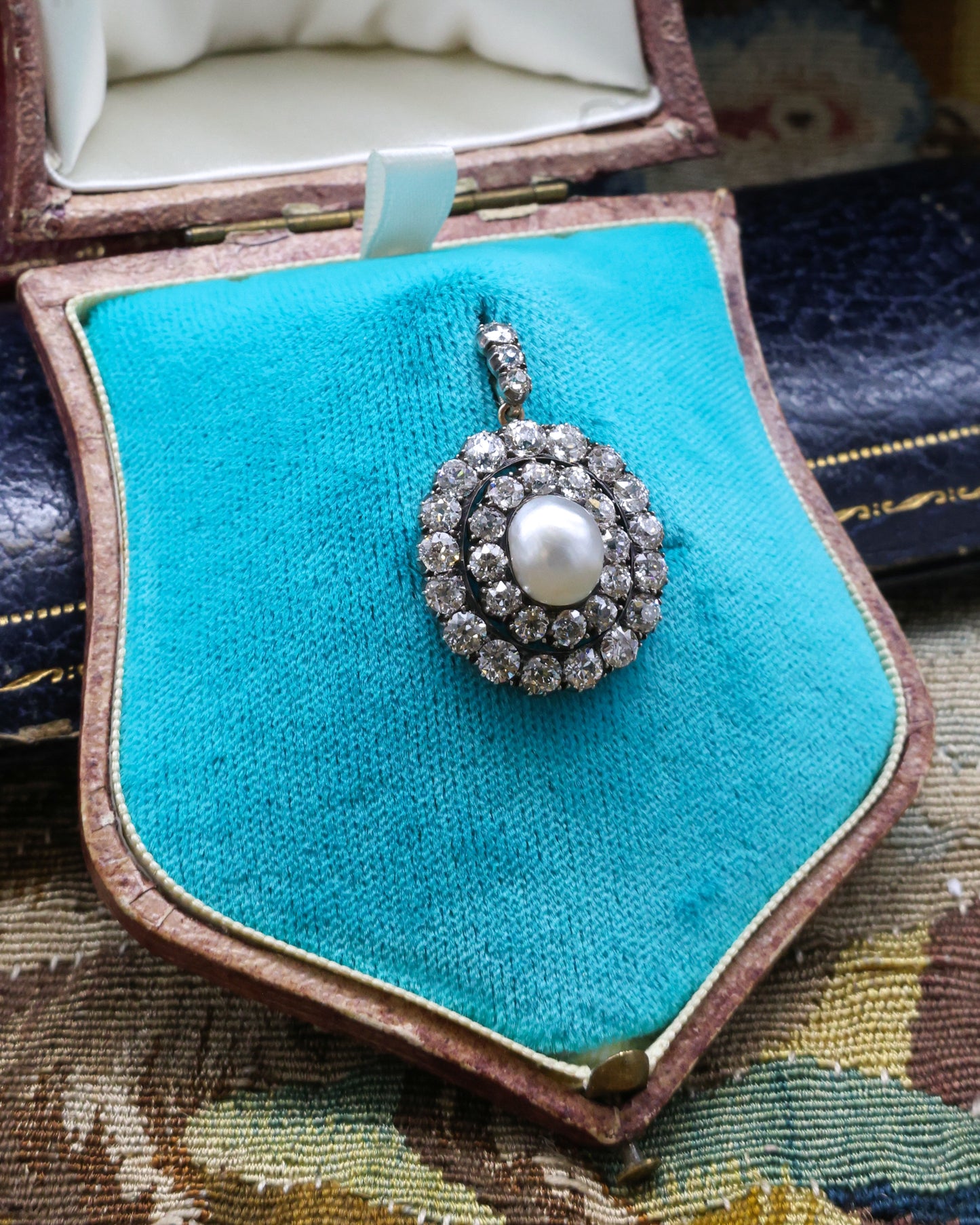 A very fine example of a Natural Pteriidae Oval Pearl and Diamond Pendant - Brooch. Victorian Circa 1890