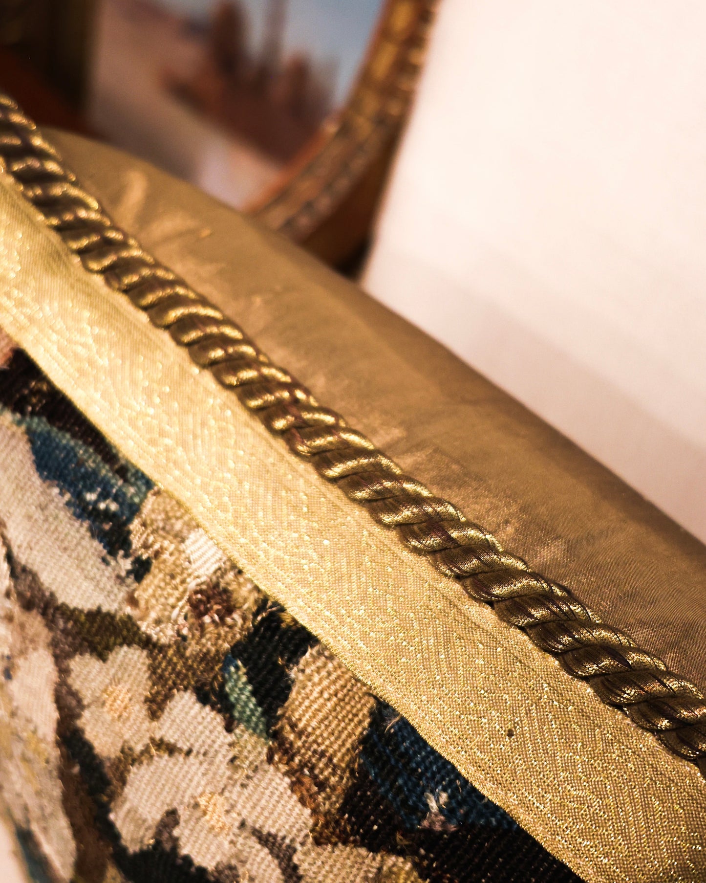 A panel of late 17th Century Hand-Woven Silk and Wool Tapestry, edged in Henry Newbury Gilt Braid and Vintage Gilt Rope Cord. Panel: Flemish. Circa 1660.