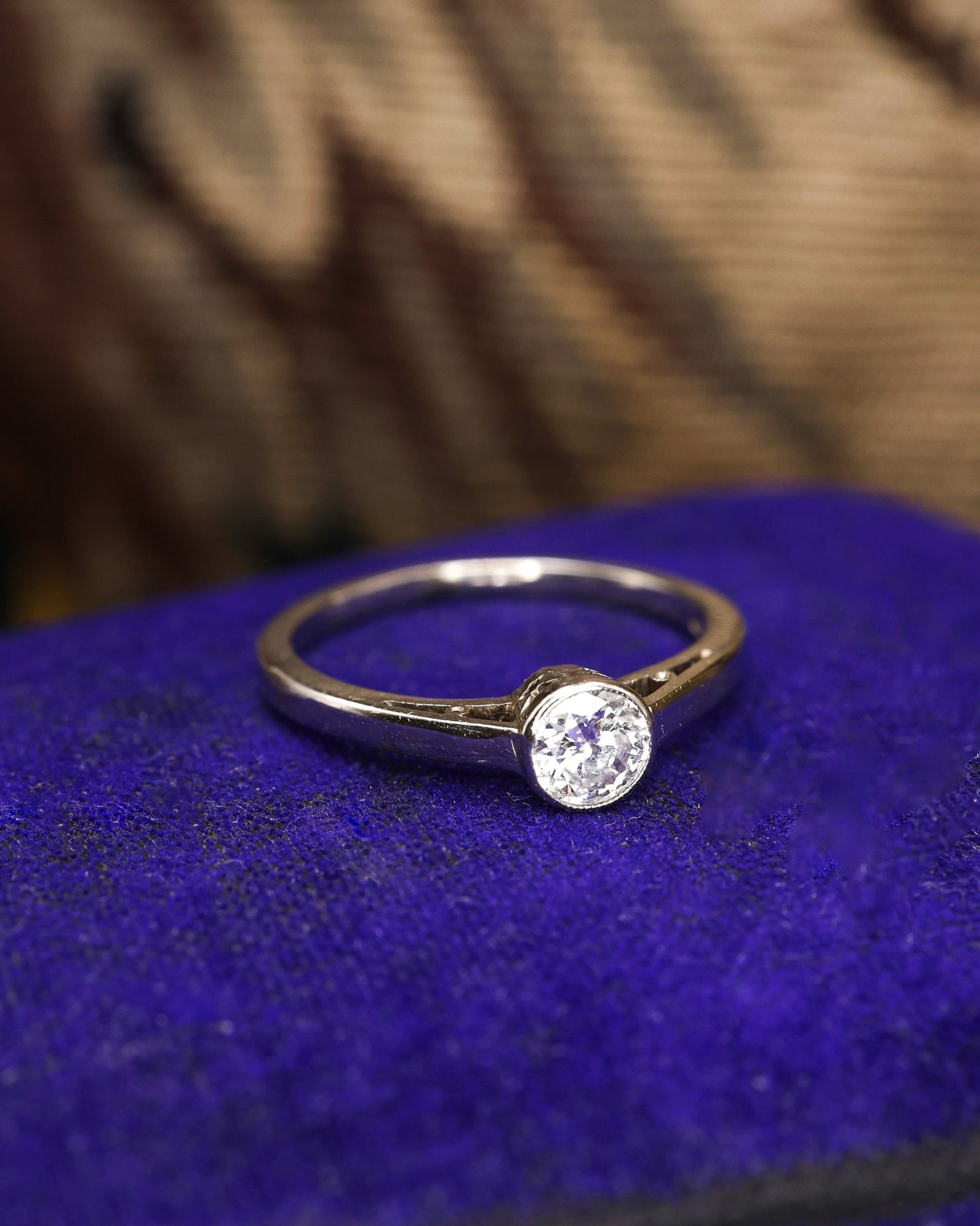 A very fine 14 ct White Gold (marked) Diamond Solitaire Ring, centrally "Rub Over Set" with one "Old Round Cut" Diamond of approximately 0.30 Carats. Circa 1960 - Robin Haydock Antique Jewellery