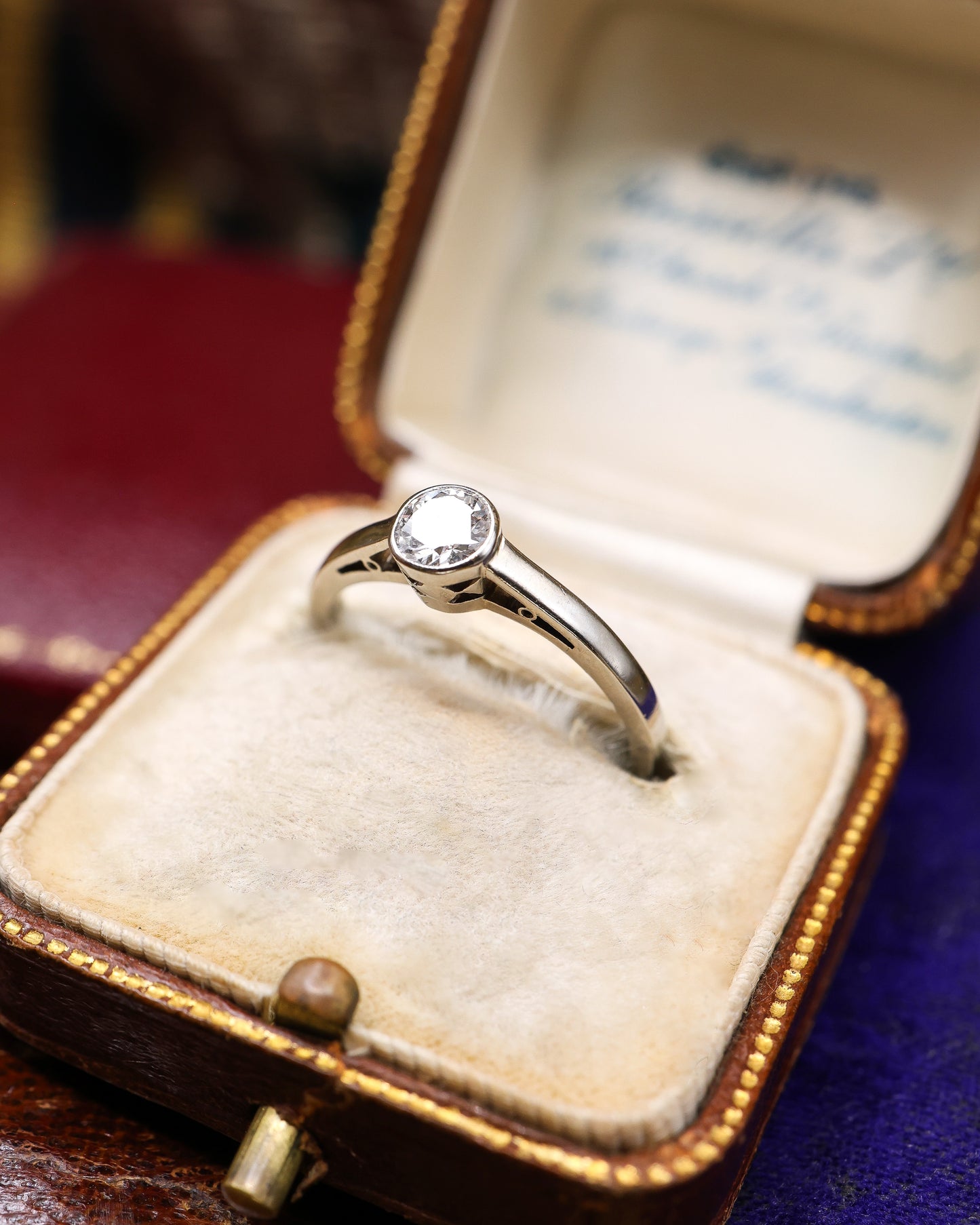 A very fine 14 ct White Gold (marked) Diamond Solitaire Ring, centrally "Rub Over Set" with one "Old Round Cut" Diamond of approximately 0.30 Carats. Circa 1960 - Robin Haydock Antique Jewellery