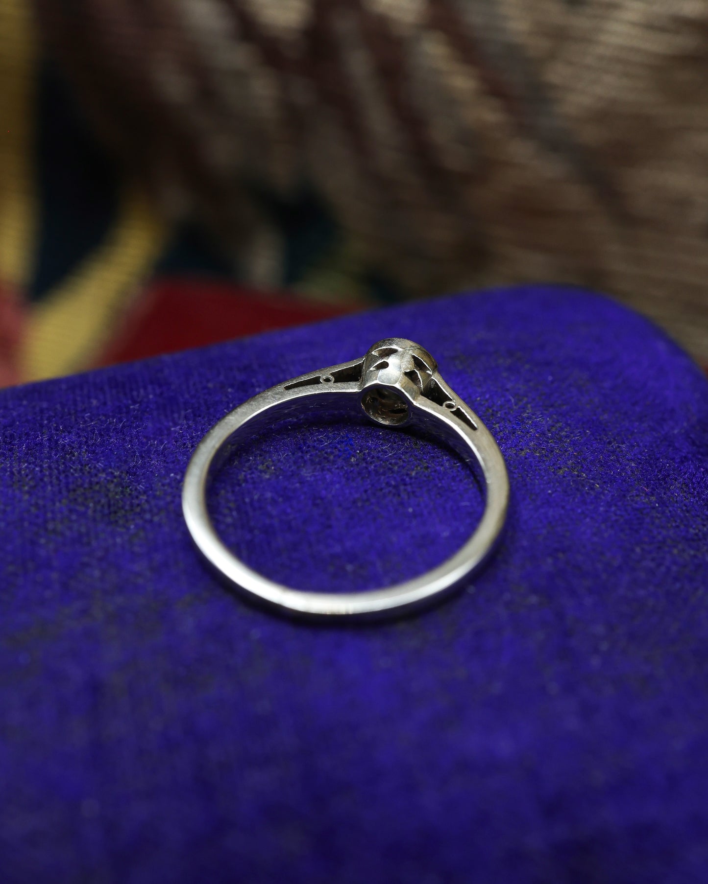 A very fine 14 ct White Gold (marked) Diamond Solitaire Ring, centrally "Rub Over Set" with one "Old Round Cut" Diamond of approximately 0.30 Carats. Circa 1960 - Robin Haydock Antique Jewellery