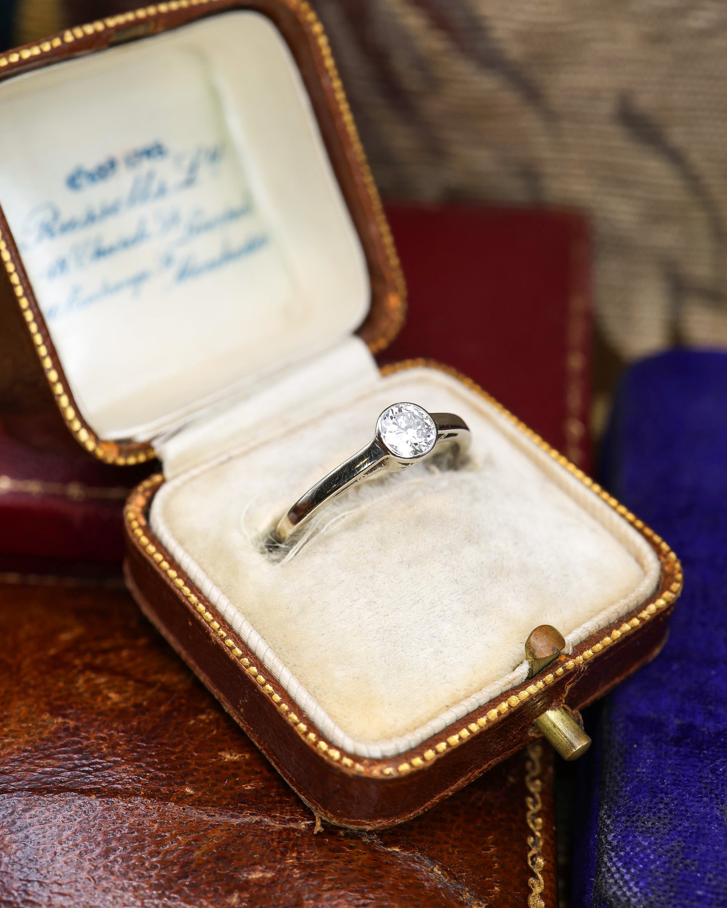 A very fine 14 ct White Gold (marked) Diamond Solitaire Ring, centrally "Rub Over Set" with one "Old Round Cut" Diamond of approximately 0.30 Carats. Circa 1960 - Robin Haydock Antique Jewellery