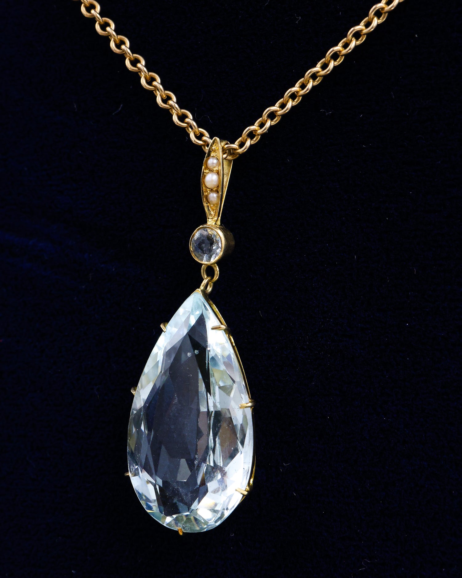 A fine 18ct. (tested), Yellow Gold  Pear Shaped Aquamarine Pendant, with Seed Pearl Bail. Circa 1905. - Robin Haydock Antique Jewellery
