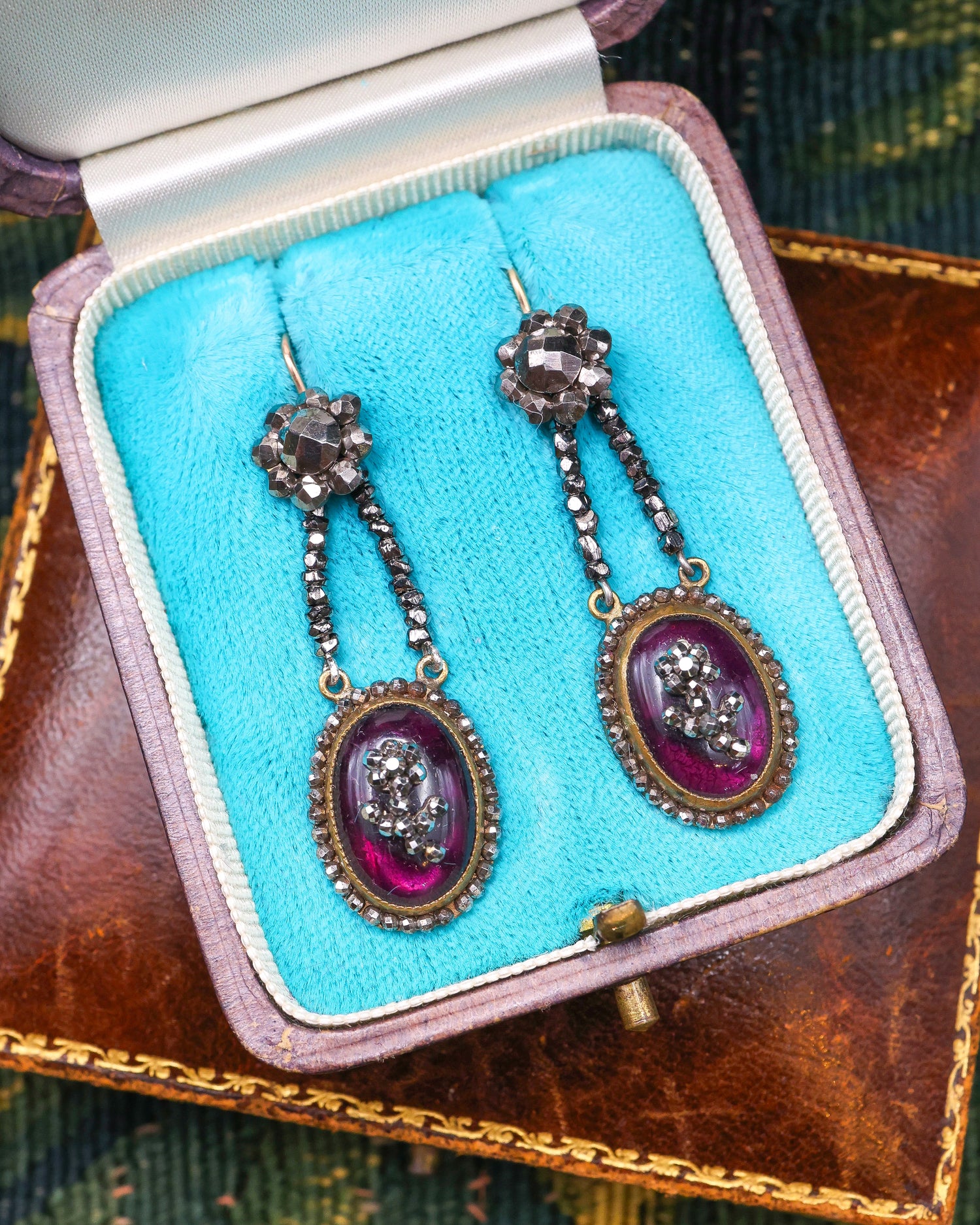 A Fine pair of Georgian, Cut Steel and Cabochon Garnet drop earrings, with 15ct Yellow Gold (tested), fittings circa 1800. - Robin Haydock Antique Jewellery