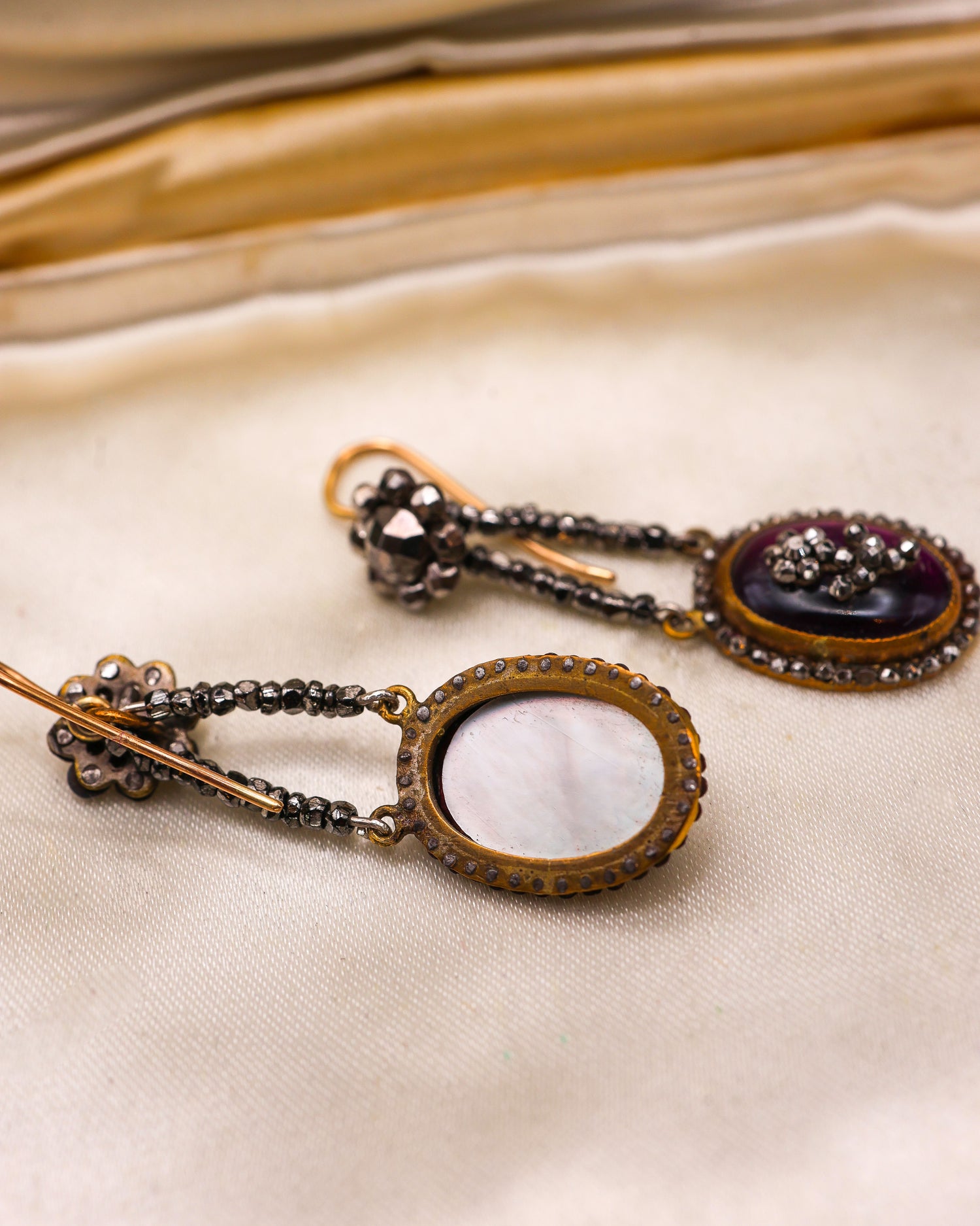 A Fine pair of Georgian, Cut Steel and Cabochon Garnet drop earrings, with 15ct Yellow Gold (tested), fittings circa 1800. - Robin Haydock Antique Jewellery