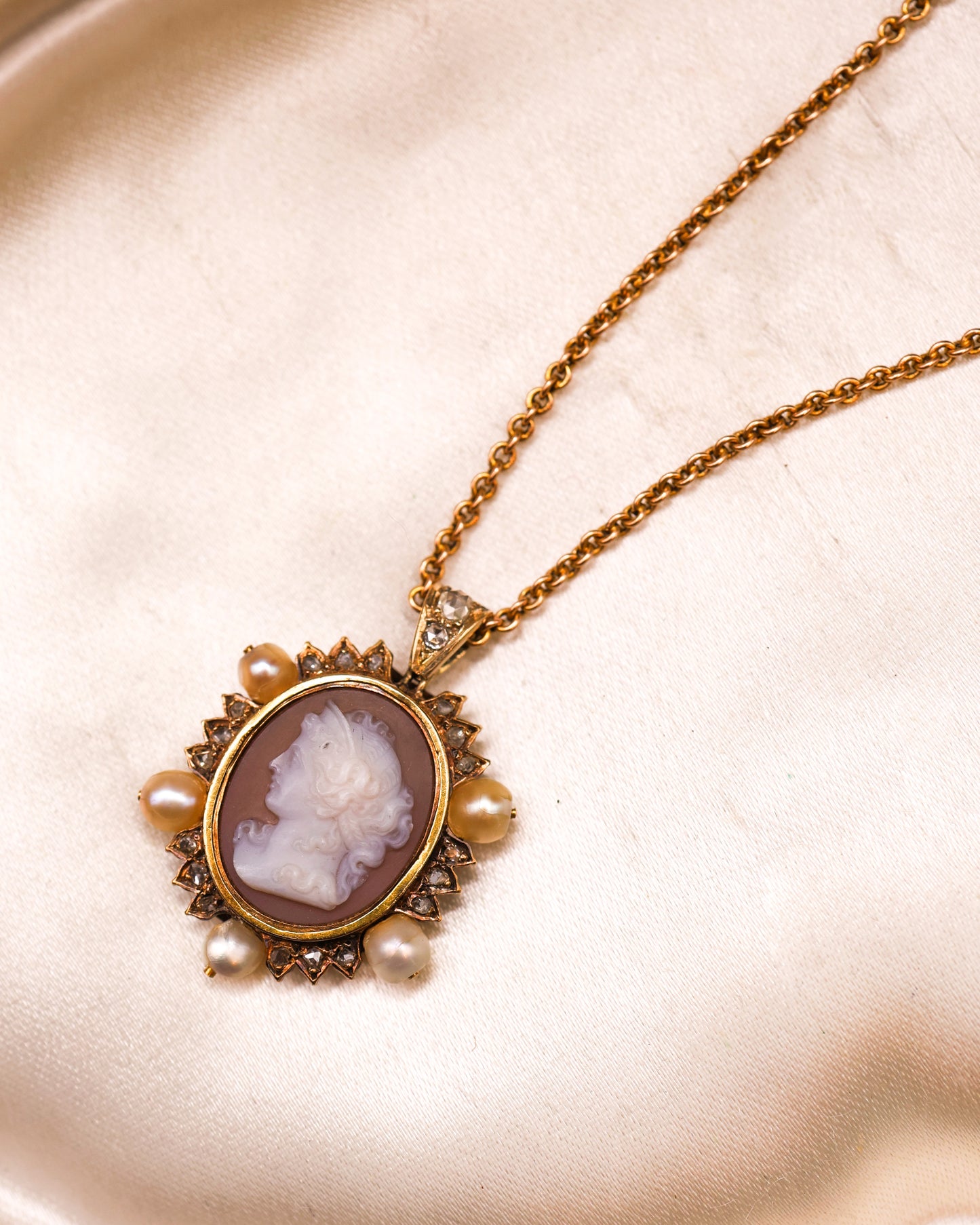 A very fine Hard stone (Carnelian), Cameo Pendant surrounded by five Natural Pearls and Diamonds in 15 carat (tested), Yellow Gold. Circa 1870