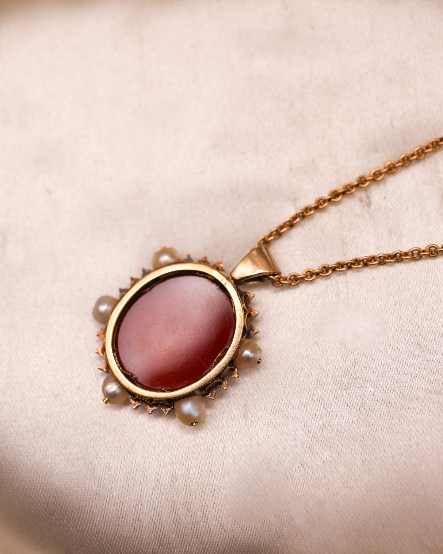 A very fine Hard stone (Carnelian), Cameo Pendant surrounded by five Natural Pearls and Diamonds in 15 carat (tested), Yellow Gold. Circa 1870
