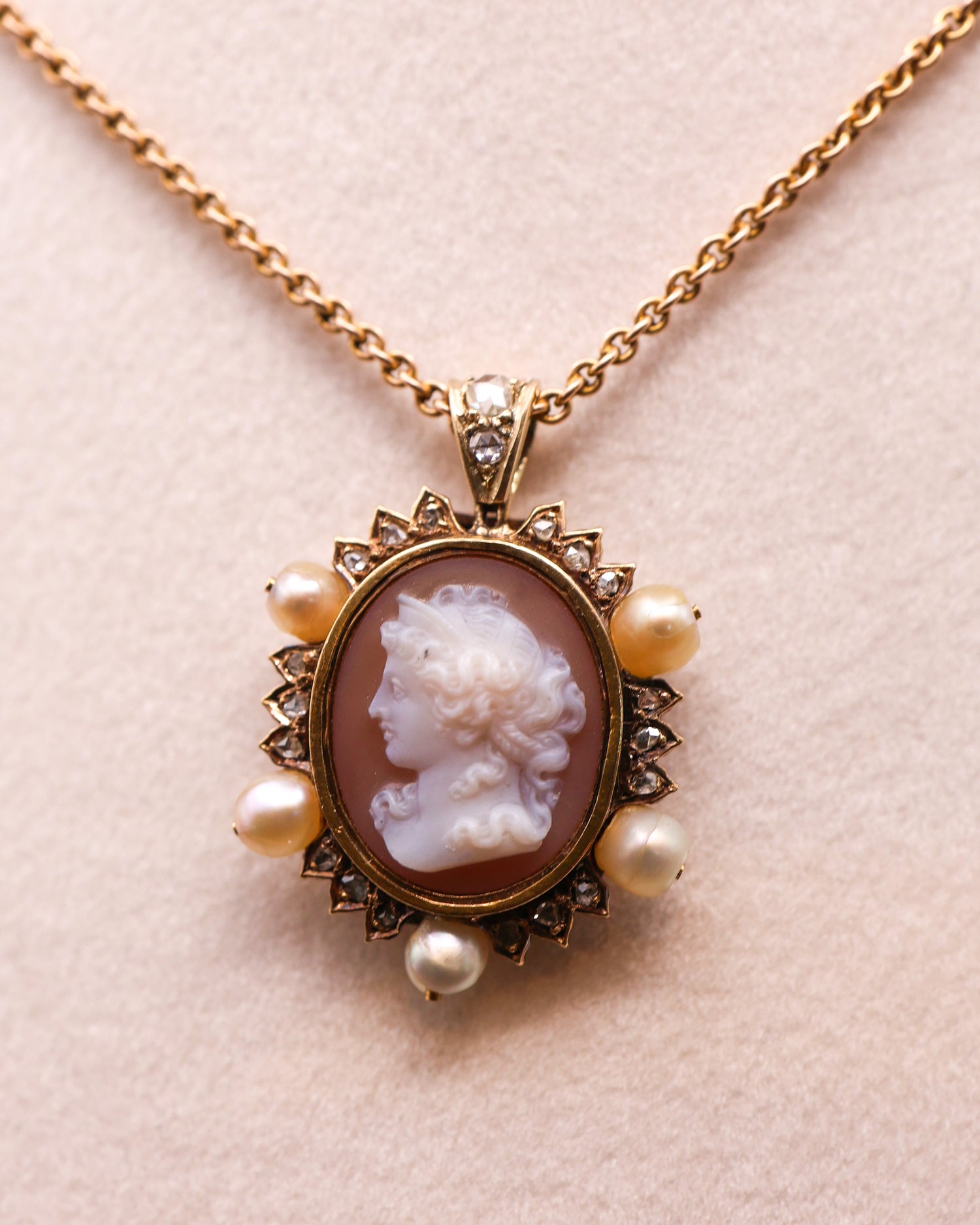 A very fine Hard stone (Carnelian), Cameo Pendant surrounded by five Natural Pearls and Diamonds in 15 carat (tested), Yellow Gold. Circa 1870 - Robin Haydock Antique Jewellery