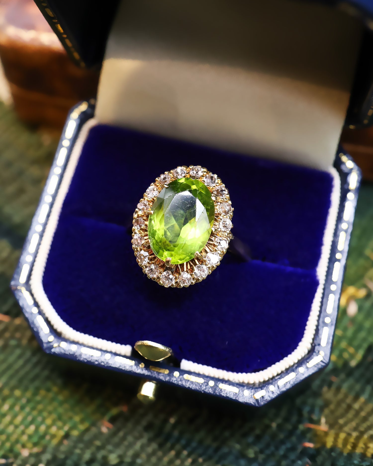A very fine 18 Carat Yellow Gold  (stamped), Oval Cut Peridot and Old Cut Diamond Cluster Ring, English Circa 1950. - Robin Haydock Antiques