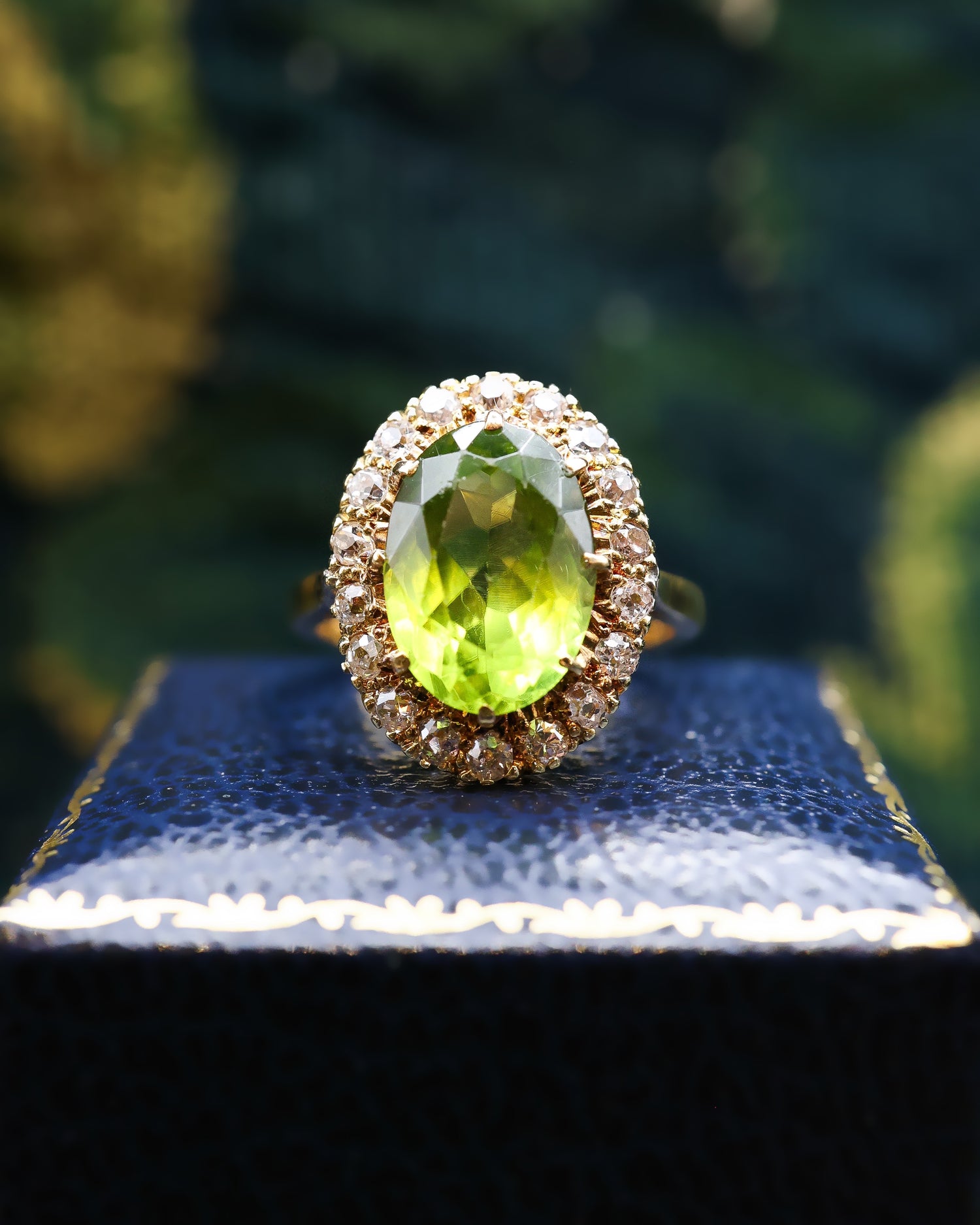 A very fine 18 Carat Yellow Gold  (stamped), Oval Cut Peridot and Old Cut Diamond Cluster Ring, English Circa 1950. - Robin Haydock Antiques