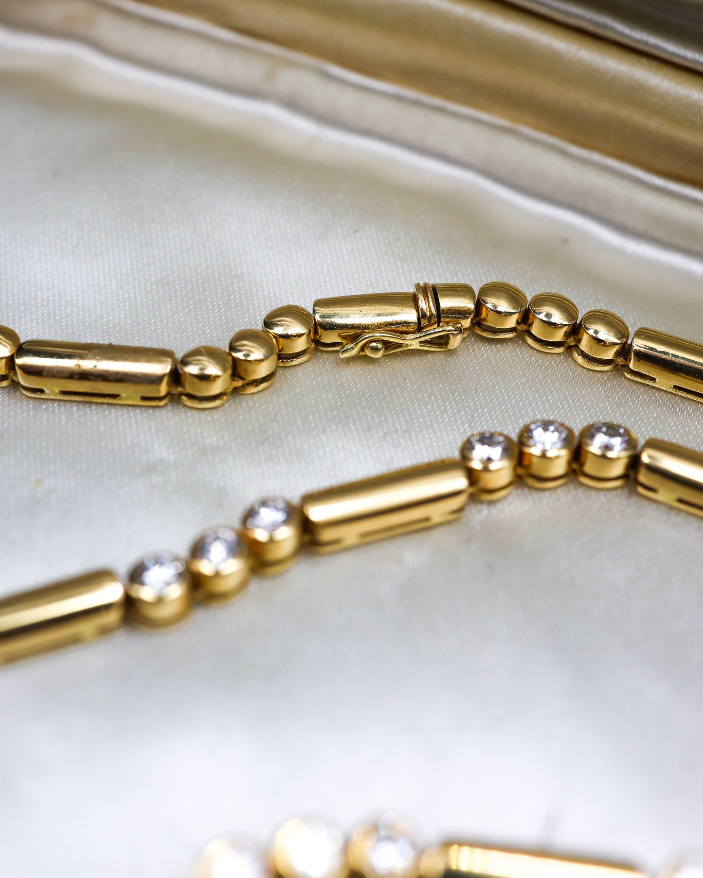 A very stylish 18 Carat Yellow Gold (marked 750) Demi - Diamond Necklace. International and (worn) English marks ( date unrecognisable ) Circa 1980 - Robin Haydock Antiques