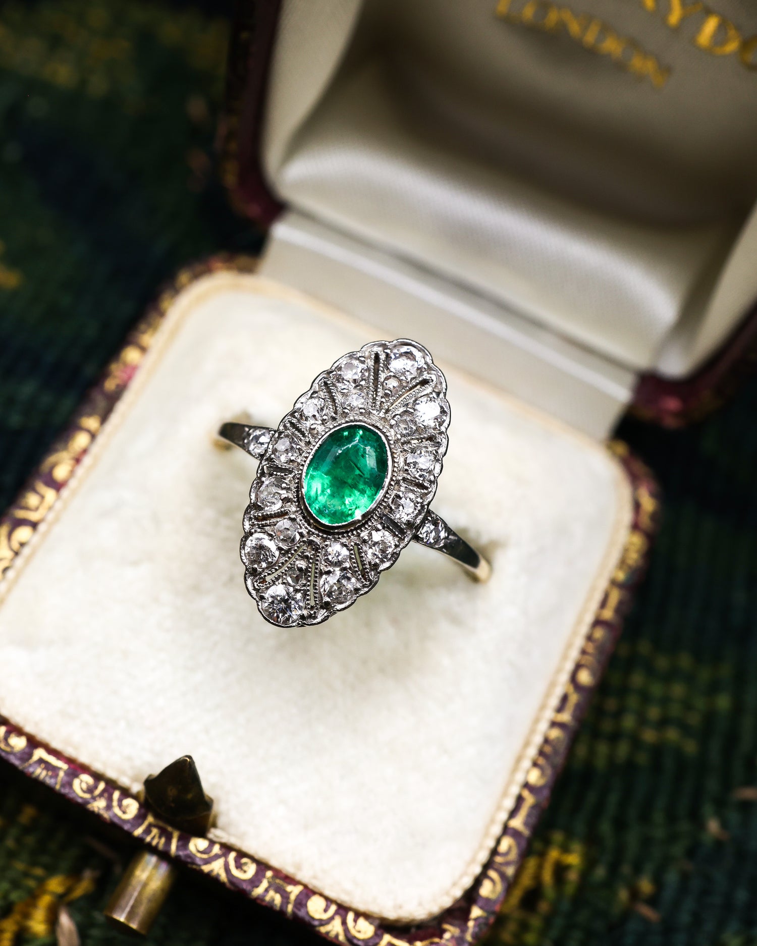 A very fine Oval Emerald & Diamond Plaque Ring mounted in 14ct Yellow Gold & Platinum, Continental, Circa 1920 - Robin Haydock Antiques
