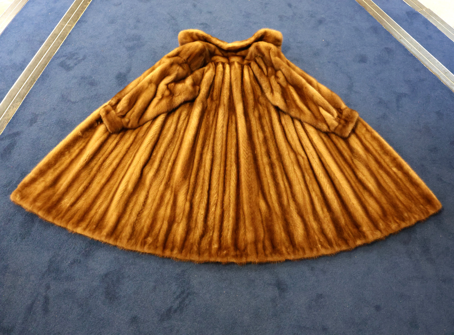 An Exceptional Full Length Demi-Buff, Fully Stranded Mink Coat with wide Raglan Sleeves, tapering to Mandarin Cuffs and a generous Swing Back. Hand made by Lawrence's of Southport. Circa 1990 - Robin Haydock Antiques