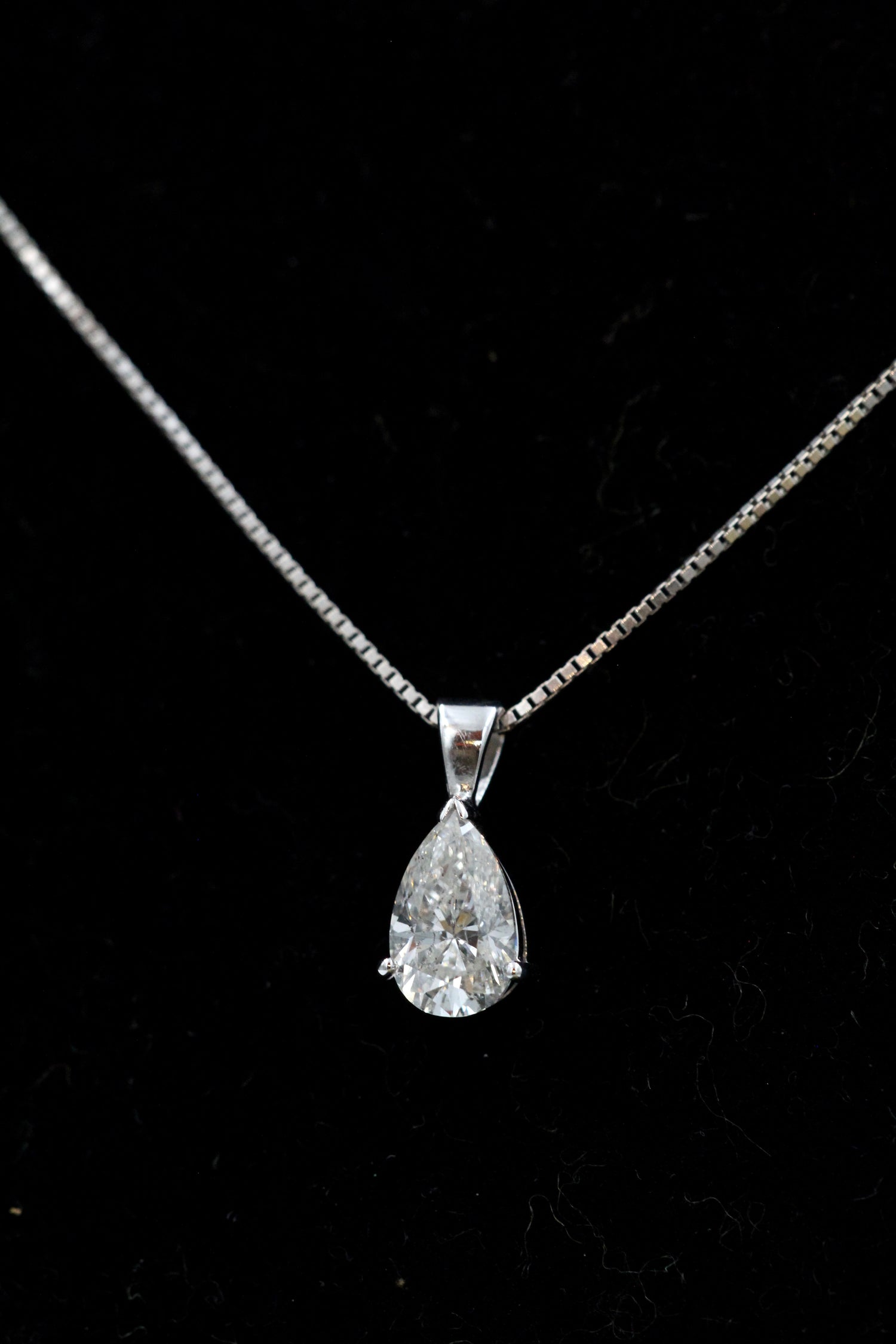 A very fine Pear Shaped  Diamond Pendant, independently assessed as being of 1.81 Carats (weighed), G Colour and SI Clarity, on an 18 Carat (marked) White Gold Chain. - Robin Haydock Antiques