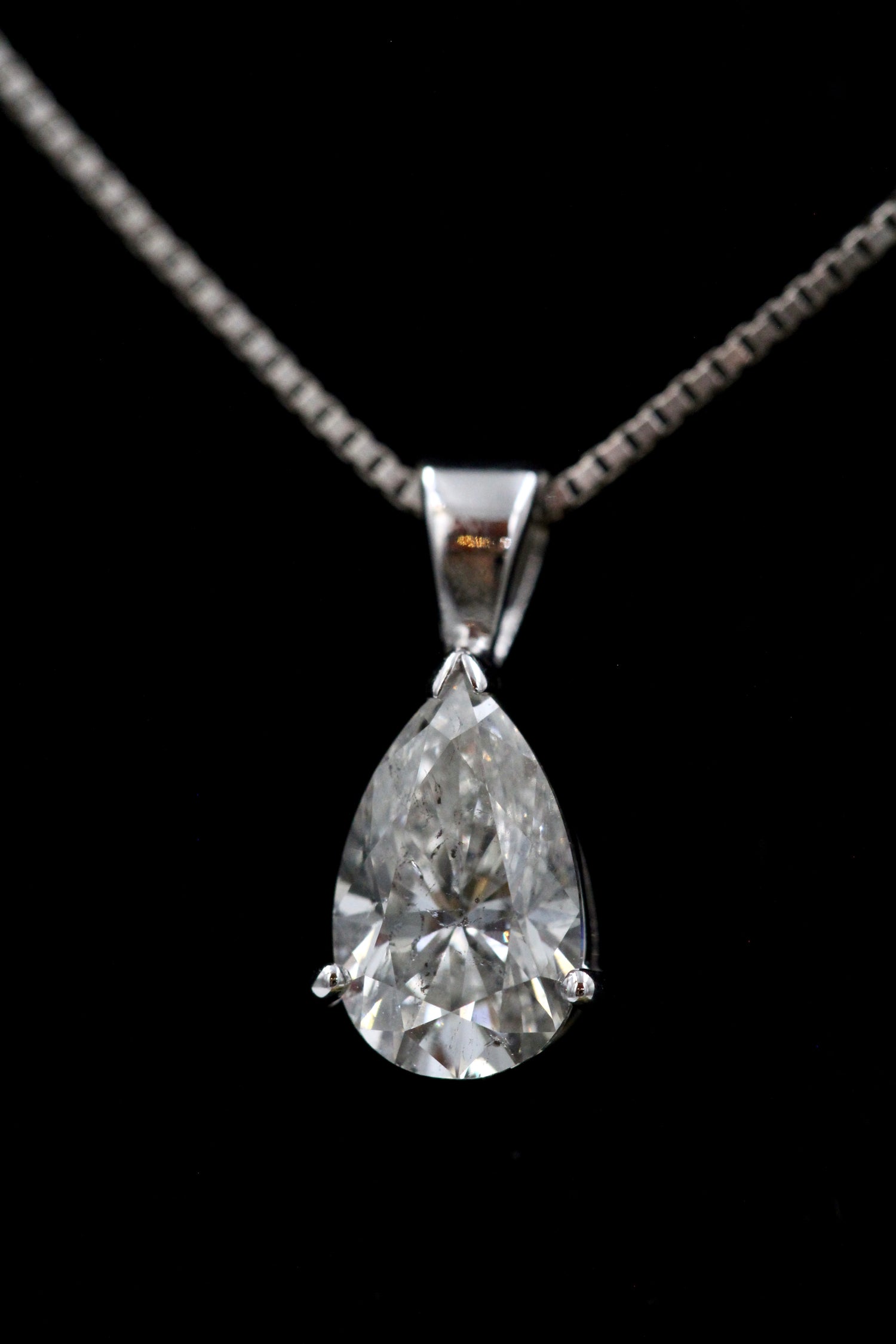 A very fine Pear Shaped  Diamond Pendant, independently assessed as being of 1.81 Carats (weighed), G Colour and SI Clarity, on an 18 Carat (marked) White Gold Chain. - Robin Haydock Antiques