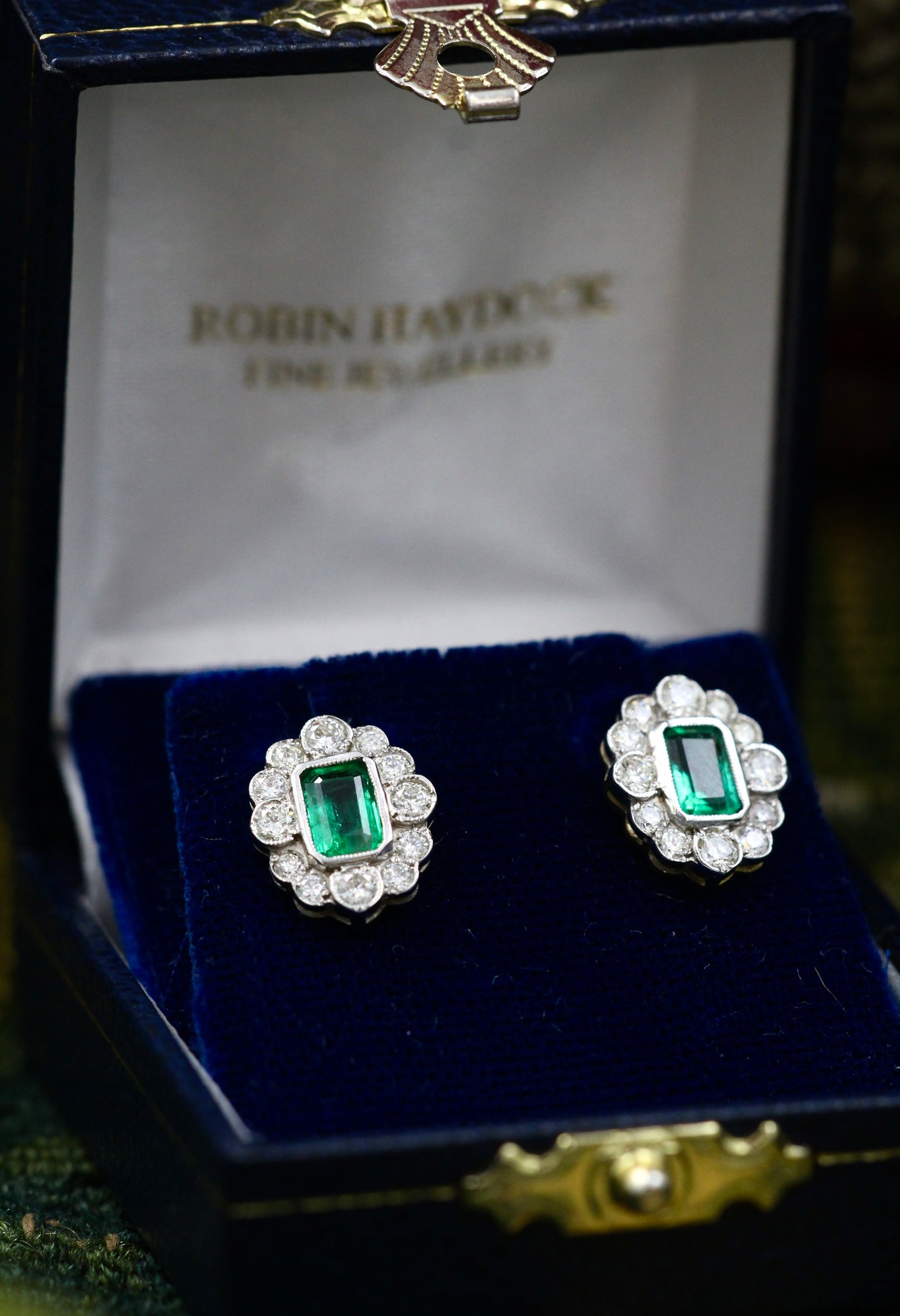 A fine pair of Oval Emerald & Diamond, 18 ct White & Yellow Gold (stamped 750) Cluster Earrings. Pre-owned - Robin Haydock Antiques