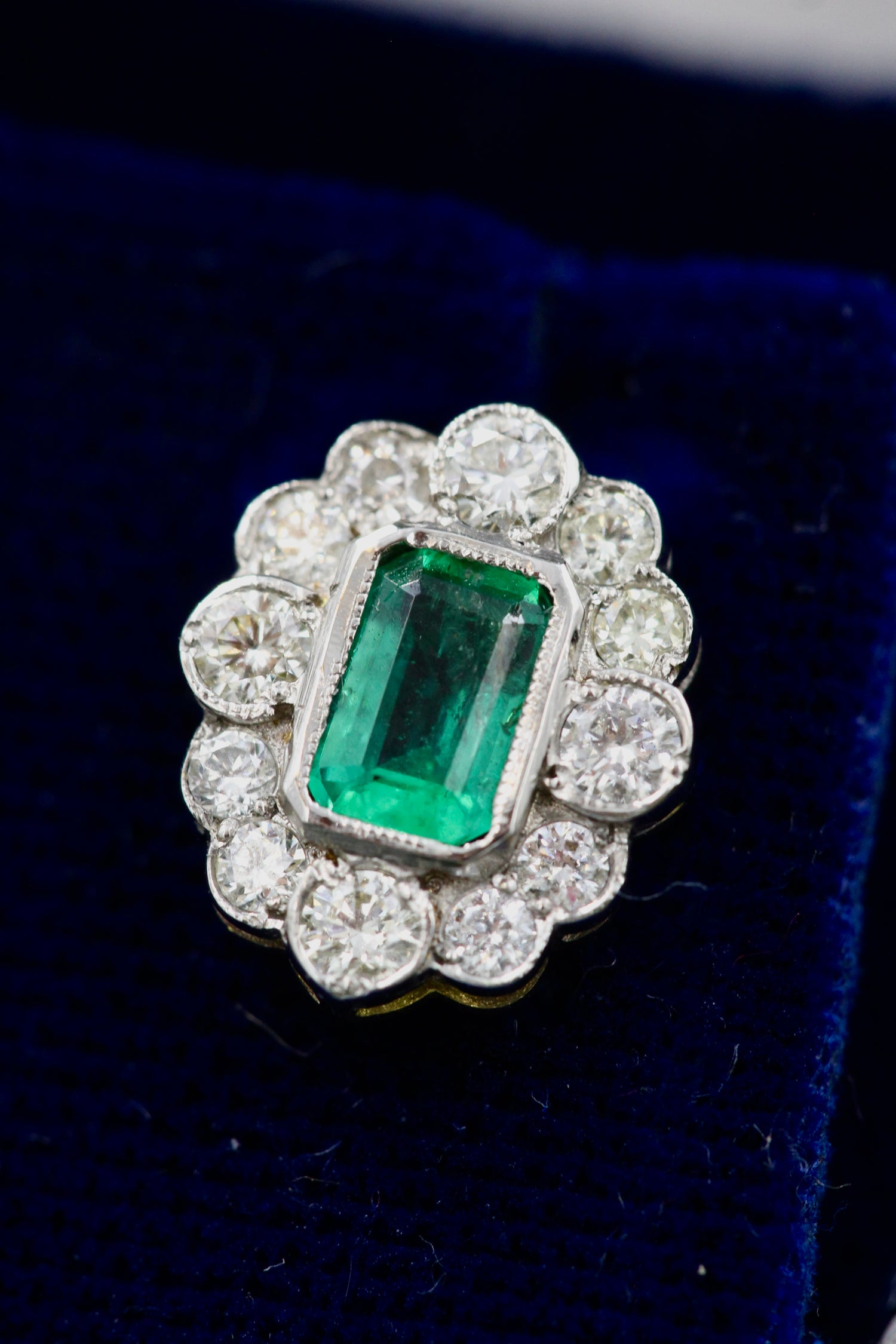 A fine pair of Oval Emerald & Diamond, 18 ct White & Yellow Gold (stamped 750) Cluster Earrings. Pre-owned - Robin Haydock Antiques