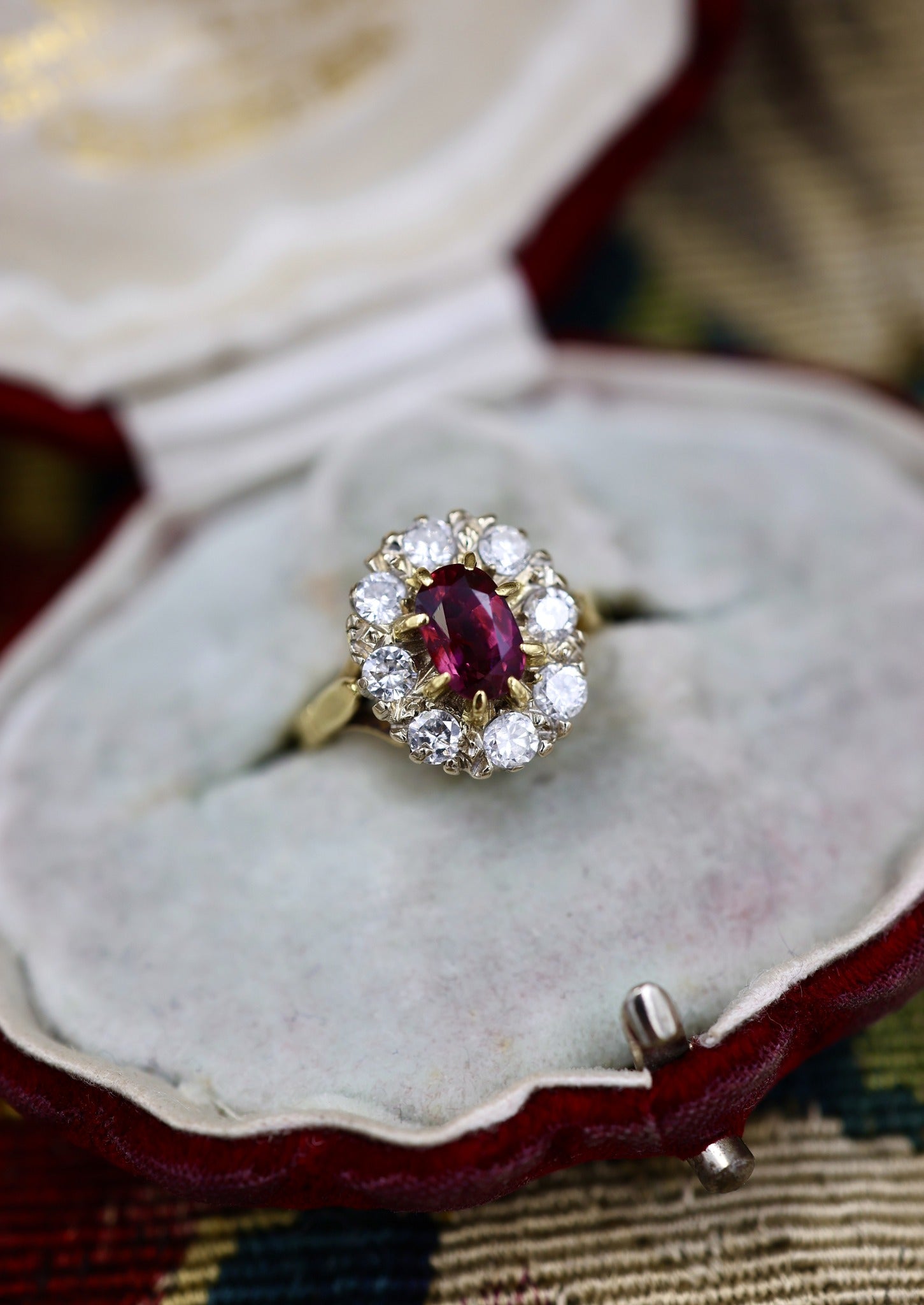 A very fine 18ct Yellow & White Gold Oval 1.35 Carat Siam Ruby & Diamond Cluster Ring. Circa 1975 - Robin Haydock Antiques