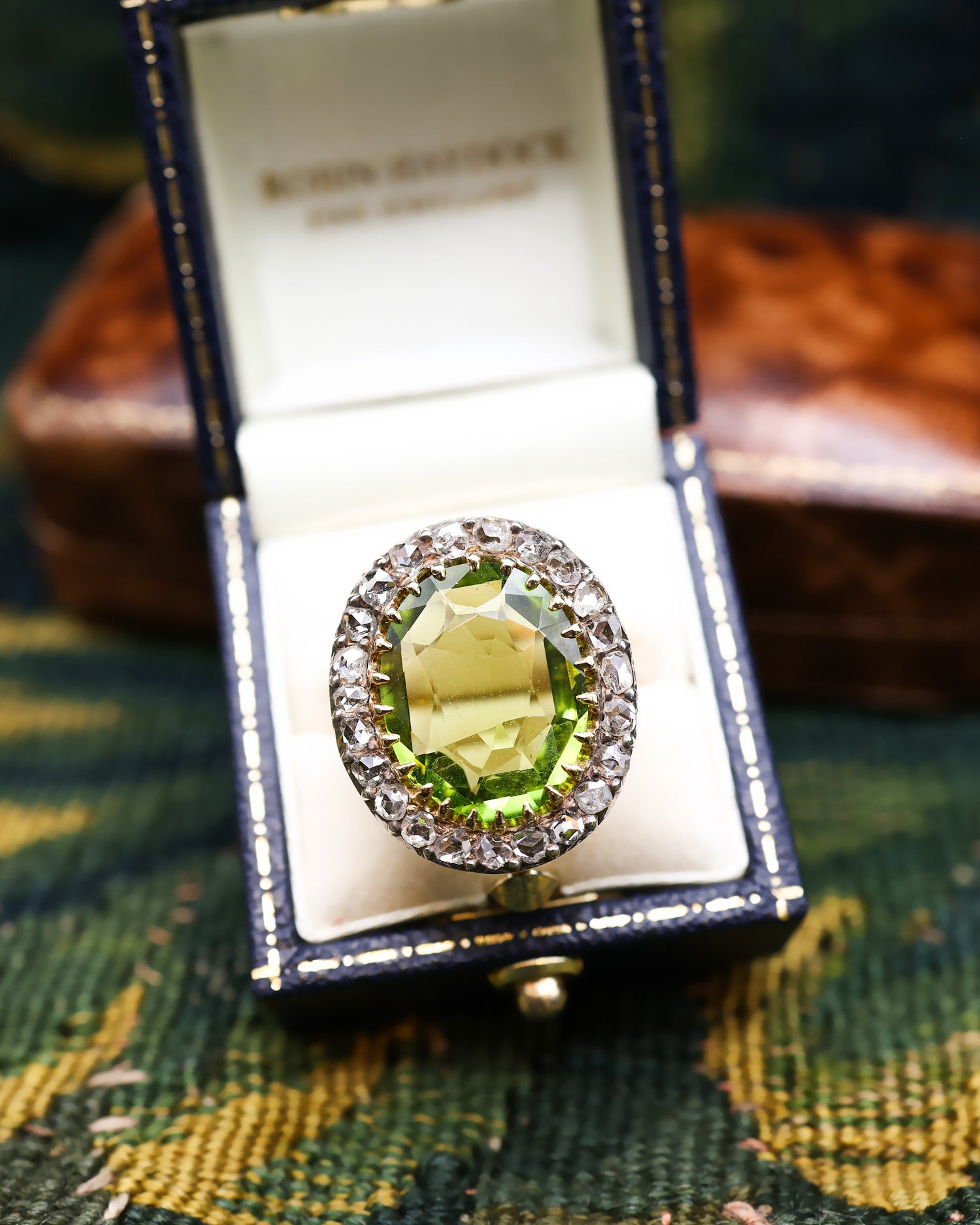 A very fine 18 carat Yellow Gold (tested), Silver tipped Peridot and Rose Cut Diamond Cluster Ring. Circa 1900. - Robin Haydock Antiques
