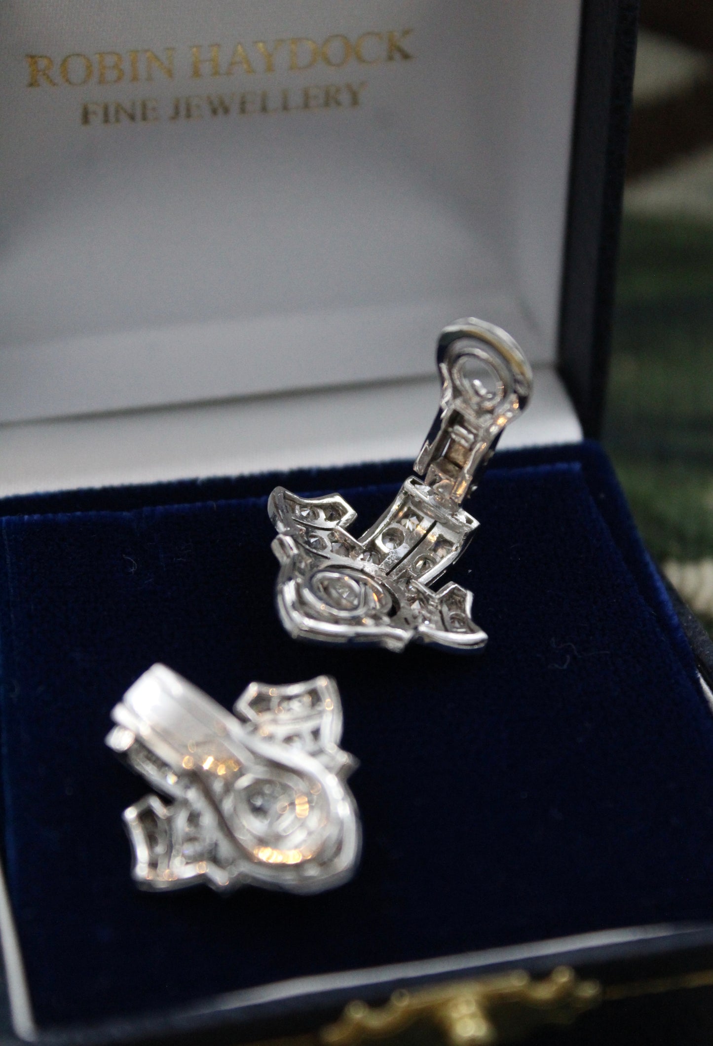 An exceptional pair of Platinum and 18 Carat White Gold Diamond Earrings, set with two Round Brilliant Cut Diamonds and Forty Six Round Brilliant Cut Natural Diamonds on the sides. - Robin Haydock Antiques