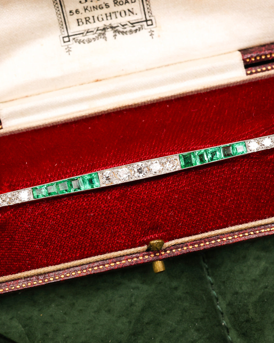 A very fine Emerald and Diamond Antique Brooch of bar design, mounted in Gold & Platinum.  English Circa 1920 - Robin Haydock Antiques