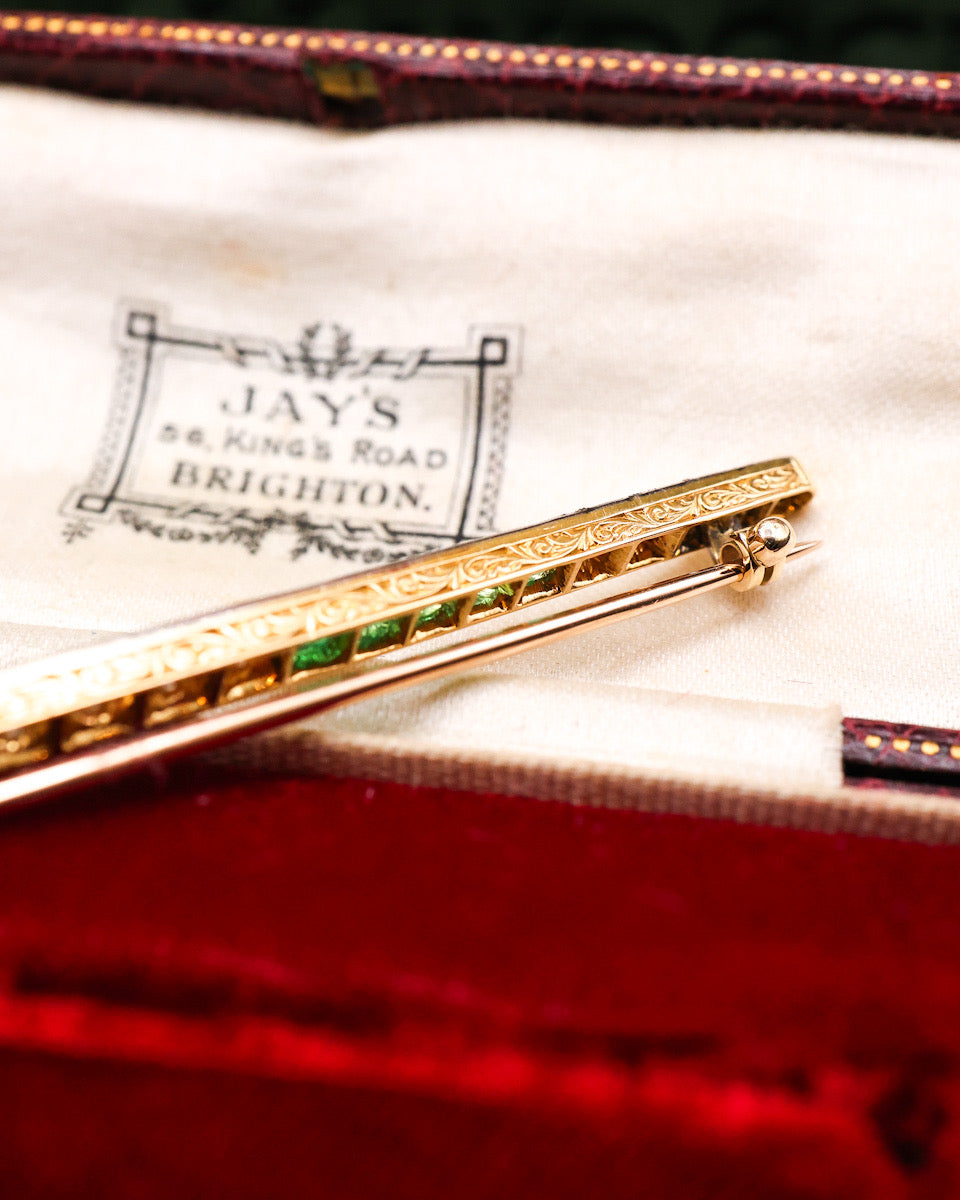 A very fine Emerald and Diamond Antique Brooch of bar design, mounted in Gold & Platinum.  English Circa 1920 - Robin Haydock Antiques