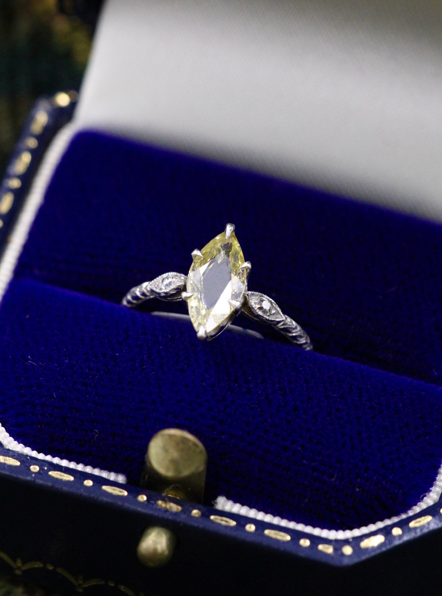 An excellent Platinum (tested) Marquise Shaped Natural and Untreated Fancy Yellow Diamond Solitaire Ring. Circa 1930. - Robin Haydock Antiques