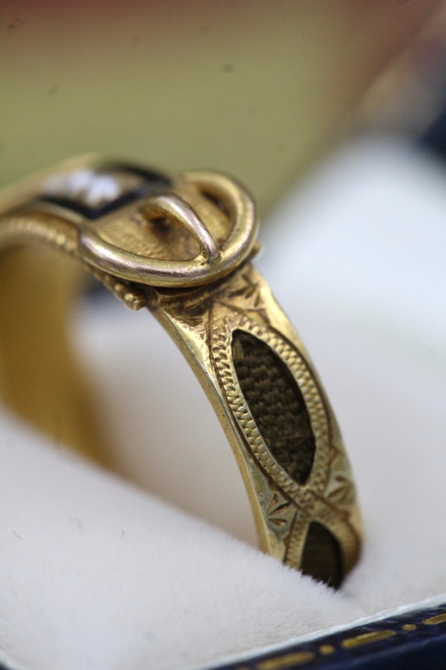 A very fine 18 carat Yellow Gold Memorial, Buckle  Ring, set  with Seed Pearls, Enamel and Woven Hair, Chester Hallmarks. Circa 1908. - Robin Haydock Antiques