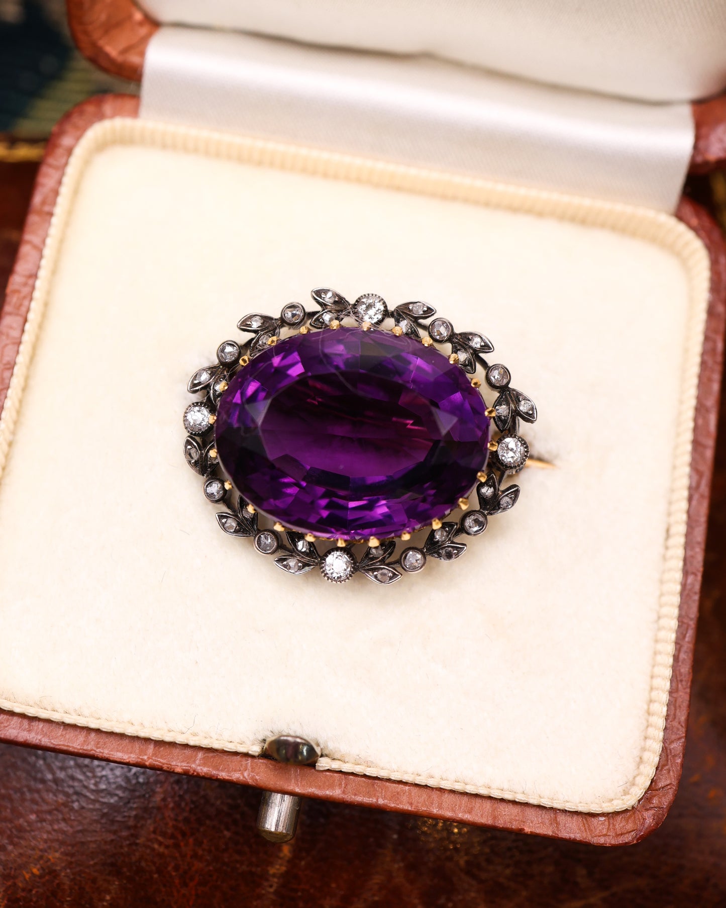 A very fine Amethyst & Diamond Oval Brooch in High Carat Yellow Gold & Platinum. English Circa 1890-1905