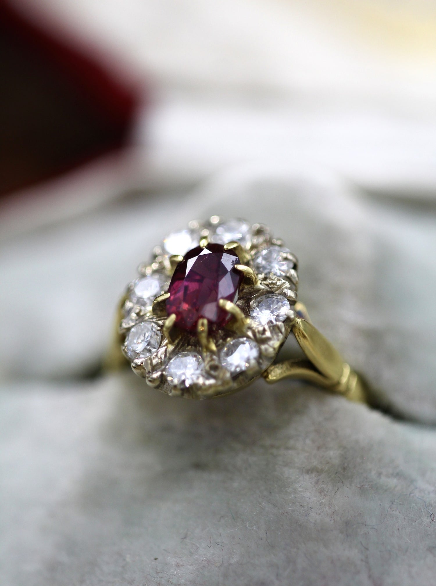A very fine 18ct Yellow & White Gold Oval 1.35 Carat Siam Ruby & Diamond Cluster Ring. Circa 1975 - Robin Haydock Antiques
