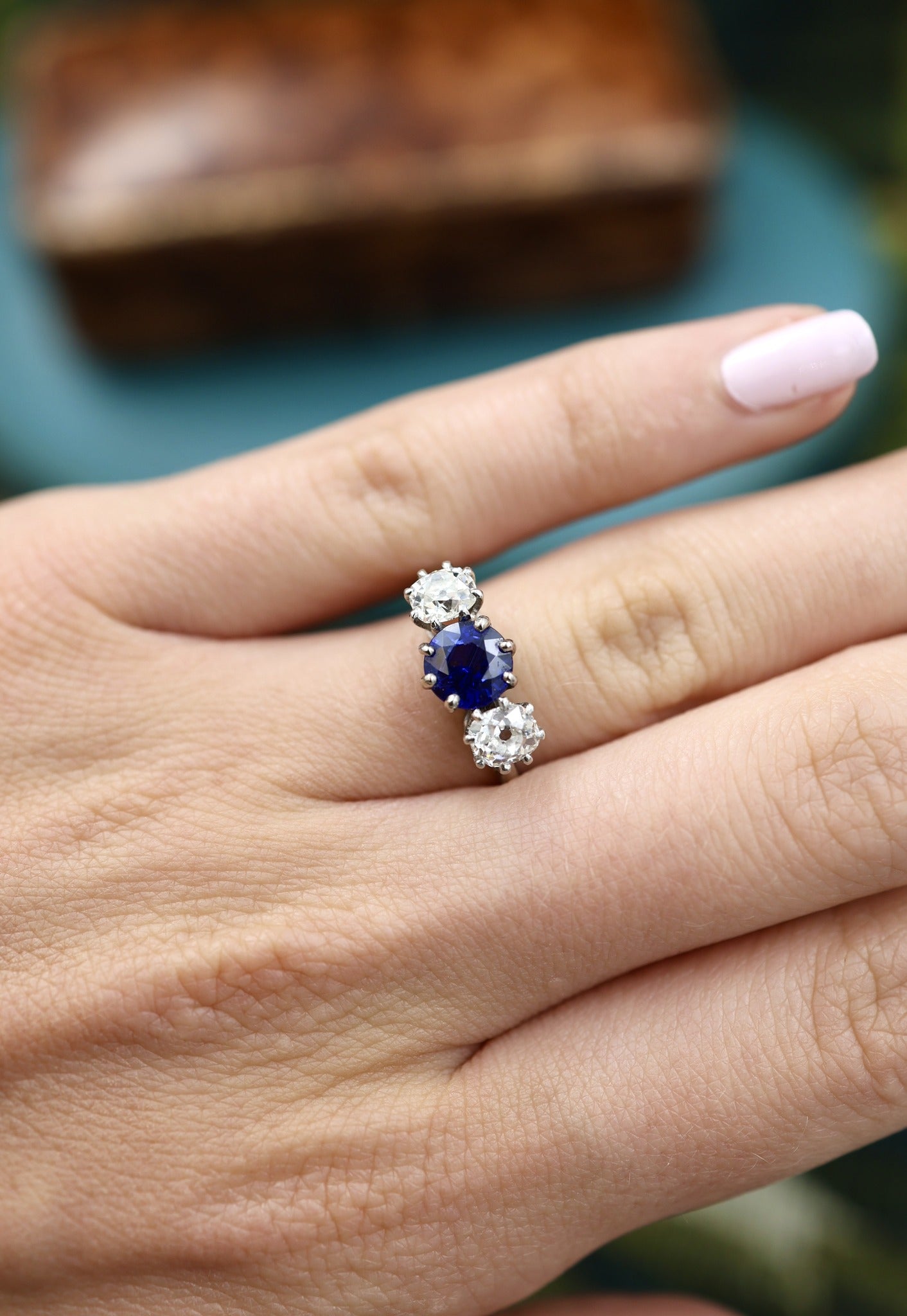 A beautiful Antique 1.45 Carat Natural Ceylon Sapphire and (two) Old Mine Cut Diamond & Platinum Engagement Ring. Circa 1930 - Robin Haydock Antiques