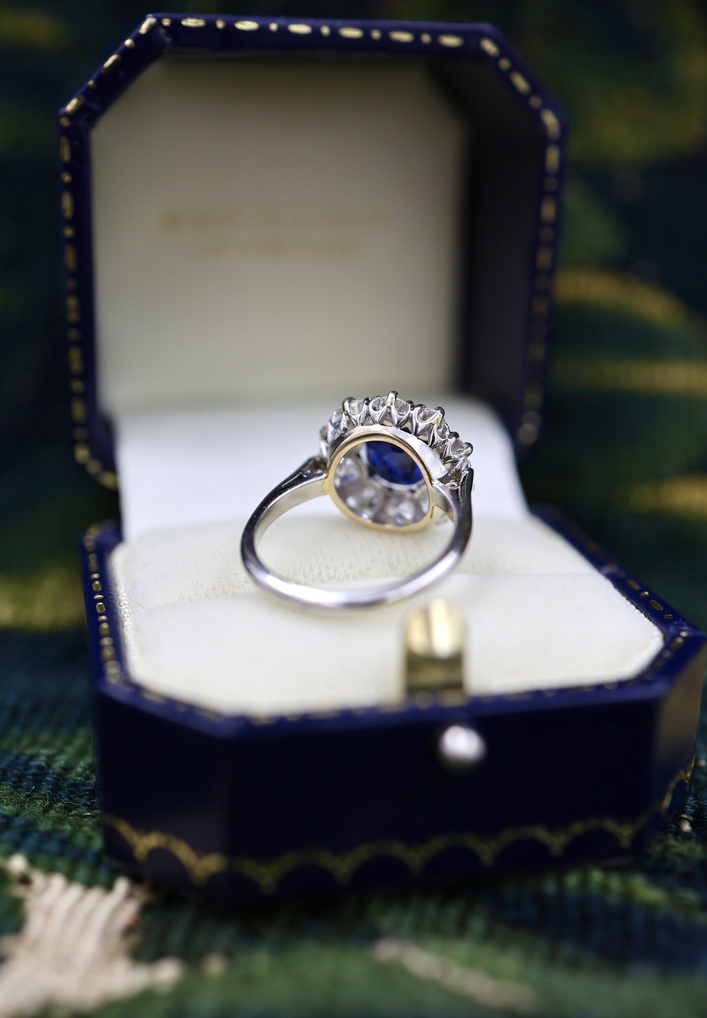 A fine Vintage, Round Sapphire and Diamond Cluster Ring mounted in Platinum (tested). Mid 20th Century. - Robin Haydock Antiques