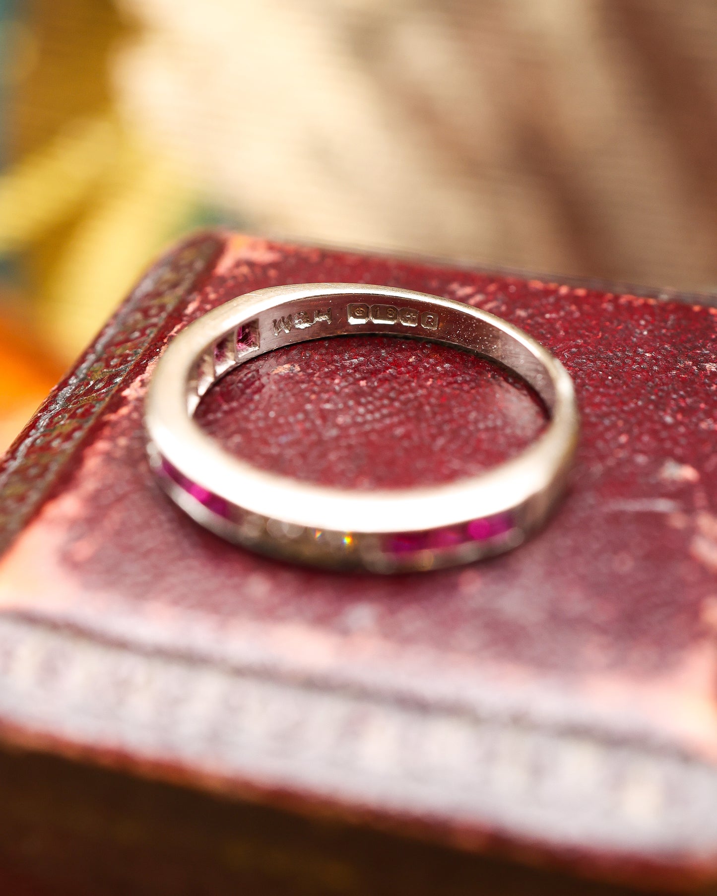 A very fine 18 ct. White Gold Ruby and Diamond Half Eternity Ring, Birmingham Marks for 1966.