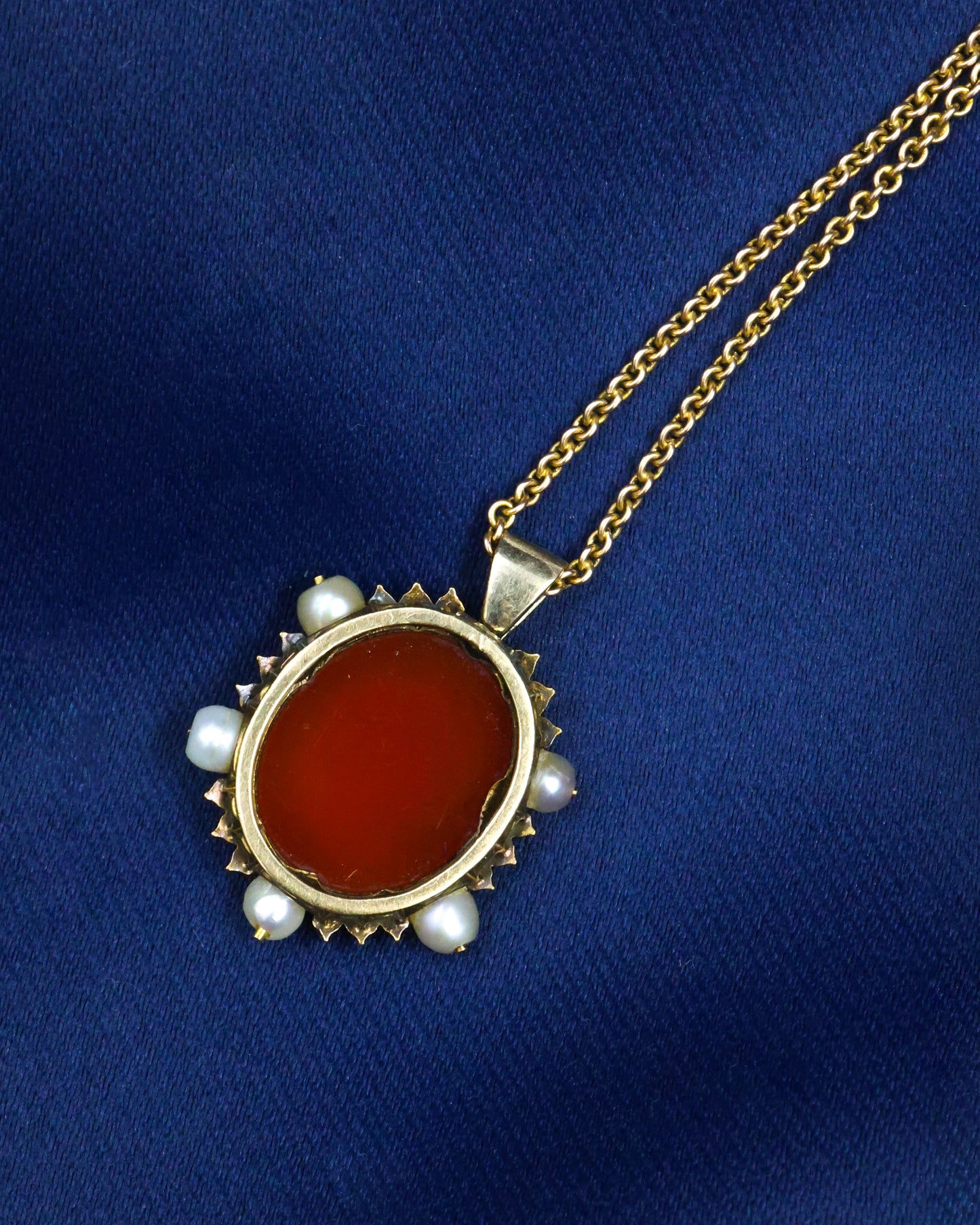 A very fine Hard stone (Carnelian), Cameo Pendant surrounded by five Natural Pearls and Diamonds in 15 carat (tested), Yellow Gold. Circa 1870