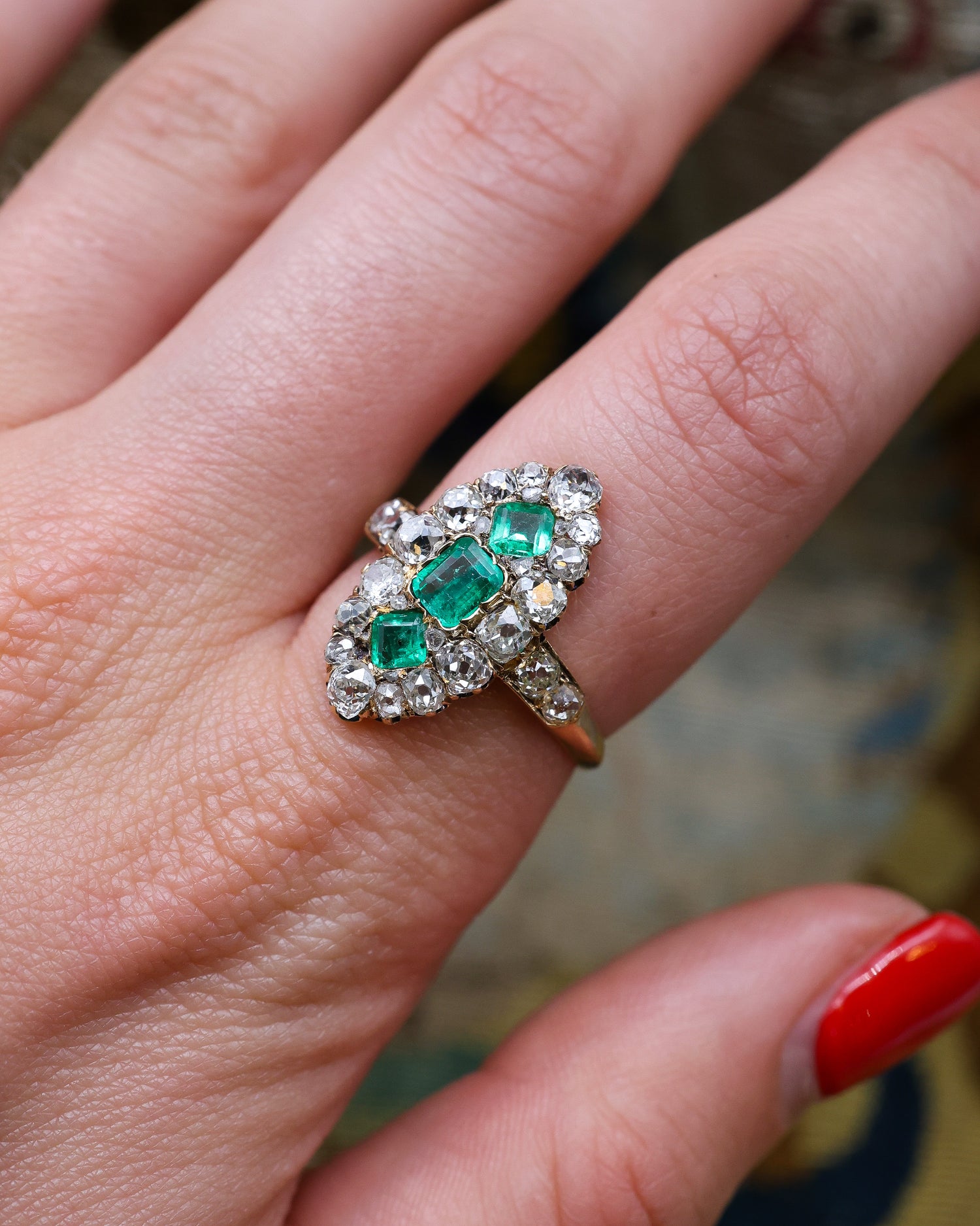 A very fine antique 18 ct. Yellow Gold (tested),  Navette shaped ring set with three Octagonal Step Cut Natural Emeralds & numerous Diamonds, with Diamond set shoulders. English. Circa 1870. - Robin Haydock Antique Jewellery
