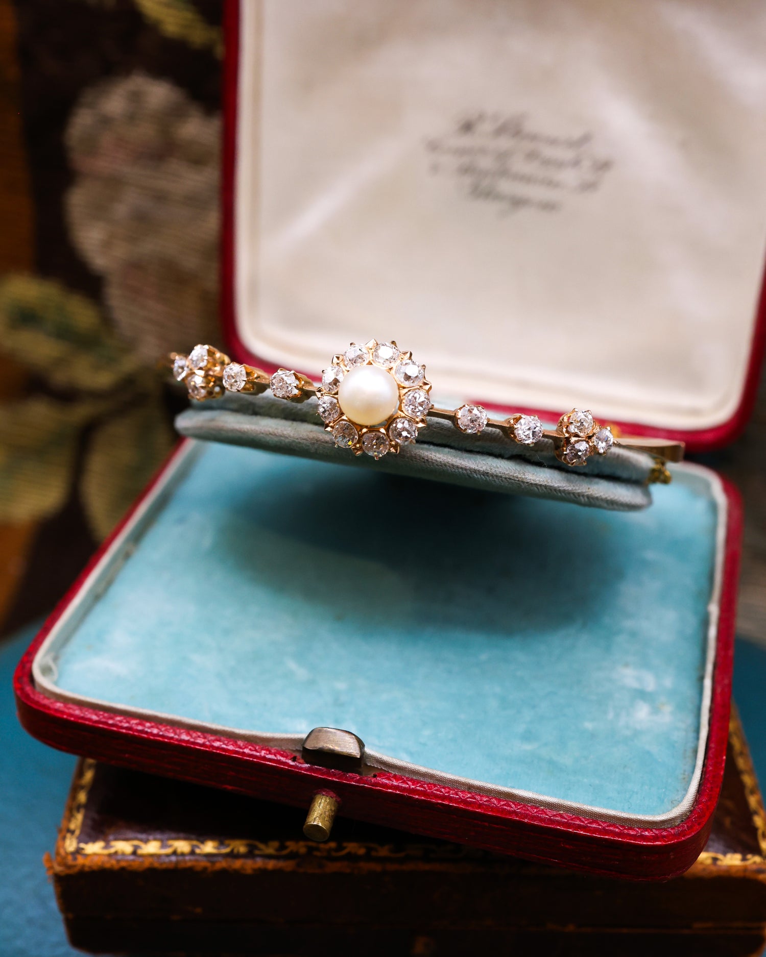A very fine Victorian Natural Saltwater Pearl & Old European Cut, Diamond Cluster Bangle set in 15ct. Yellow Gold, English, Circa 1900. - Robin Haydock Antique Jewellery