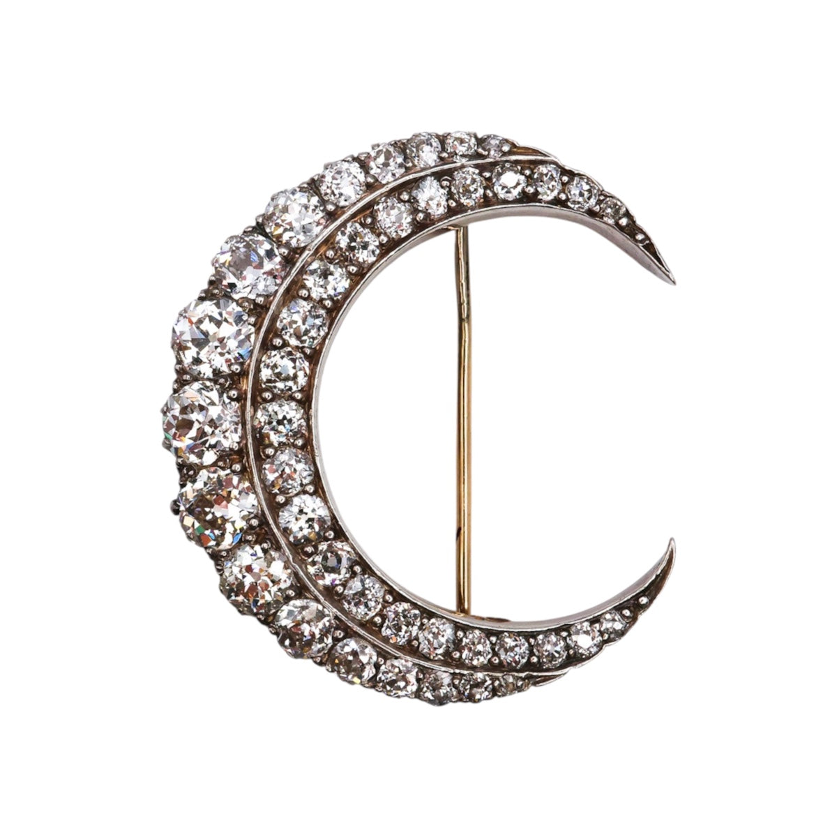 A very fine Antique Silver Tipped 15 ct. Yellow Gold Antique Diamond Crescent Brooch. English Circa 1890