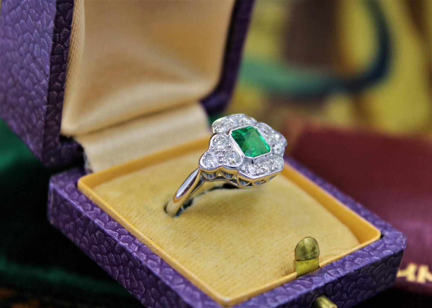 A very fine Emerald and Diamond Cluster Ring mounted in 18ct White Gold, English, Circa 1955 - Robin Haydock Antiques