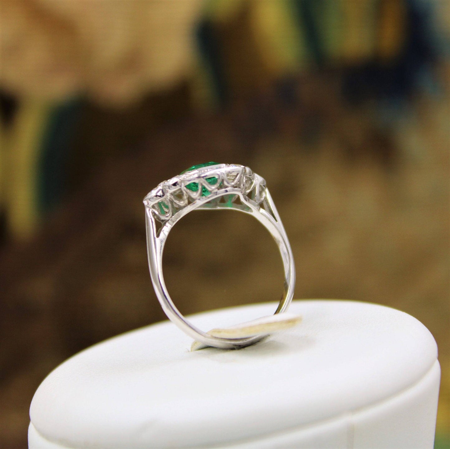 A very fine Emerald and Diamond Cluster Ring mounted in 18ct White Gold, English, Circa 1955 - Robin Haydock Antiques