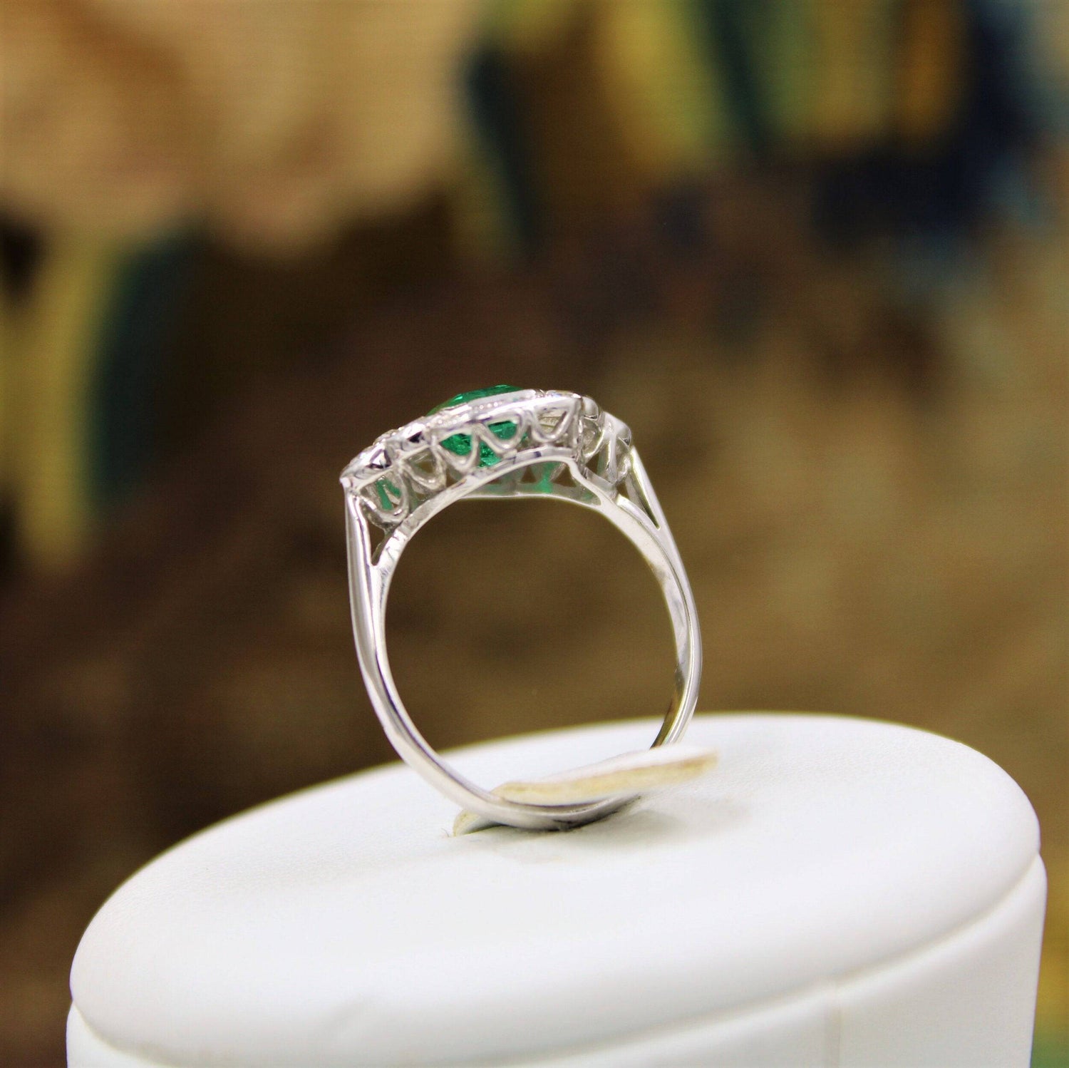 A very fine Emerald and Diamond Cluster Ring mounted in 18ct White Gold, English, Circa 1955 - Robin Haydock Antiques
