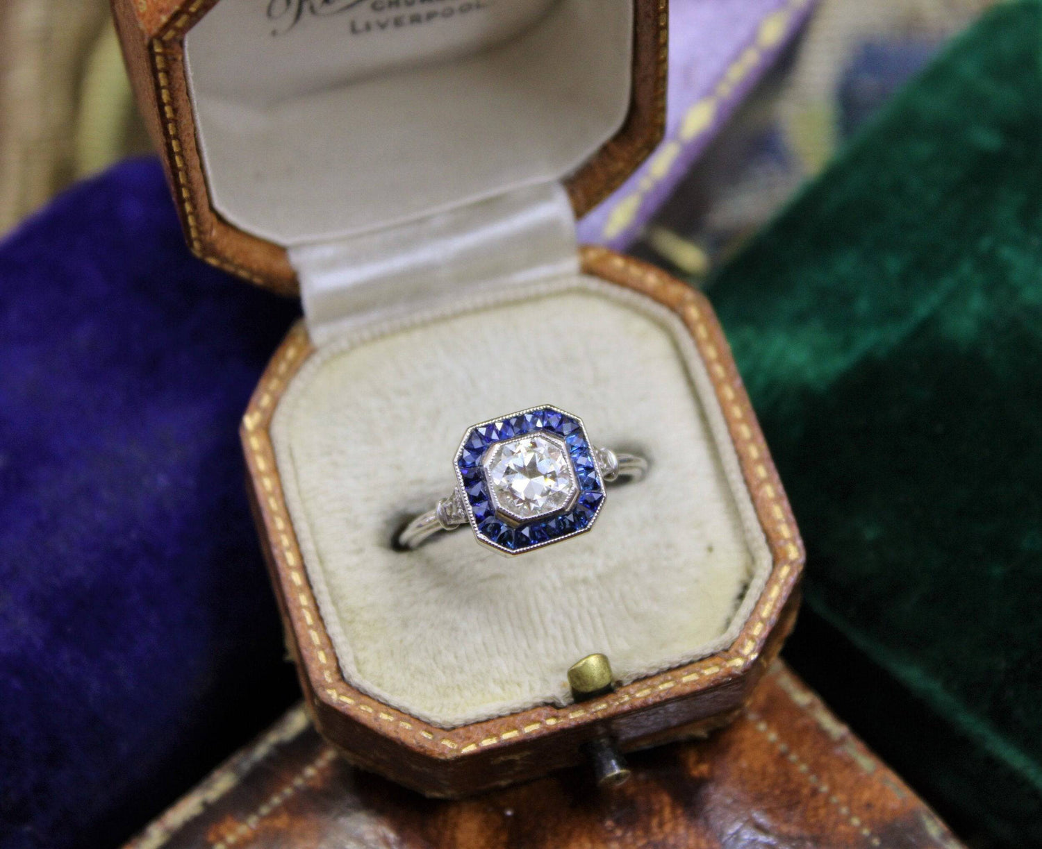 A very fine 0.85ct Diamond & Sapphire Target Ring mounted in Platinum, English, Circa 1920-1930 - Robin Haydock Antiques