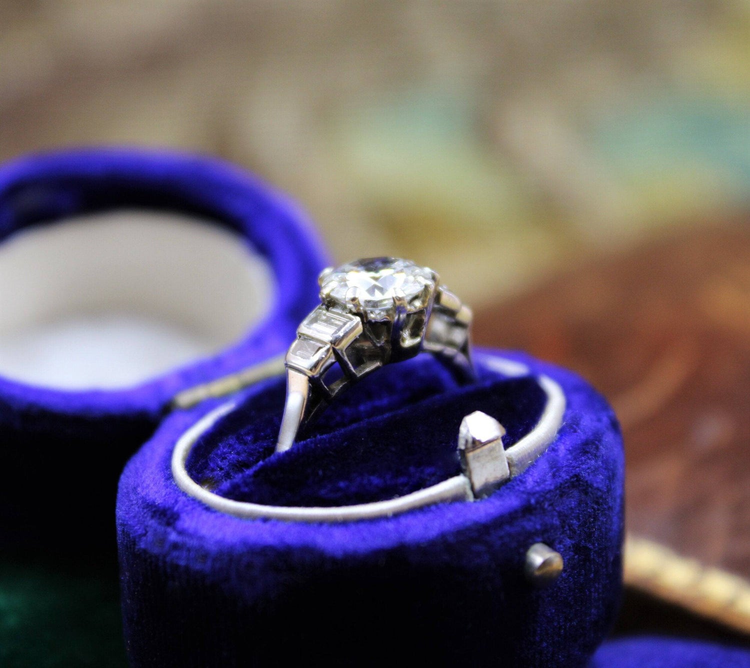 A very fine 1.16ct Diamond Solitaire Ring with Stepped Shoulders set in Platinum, English, Circa 1945 - Robin Haydock Antiques