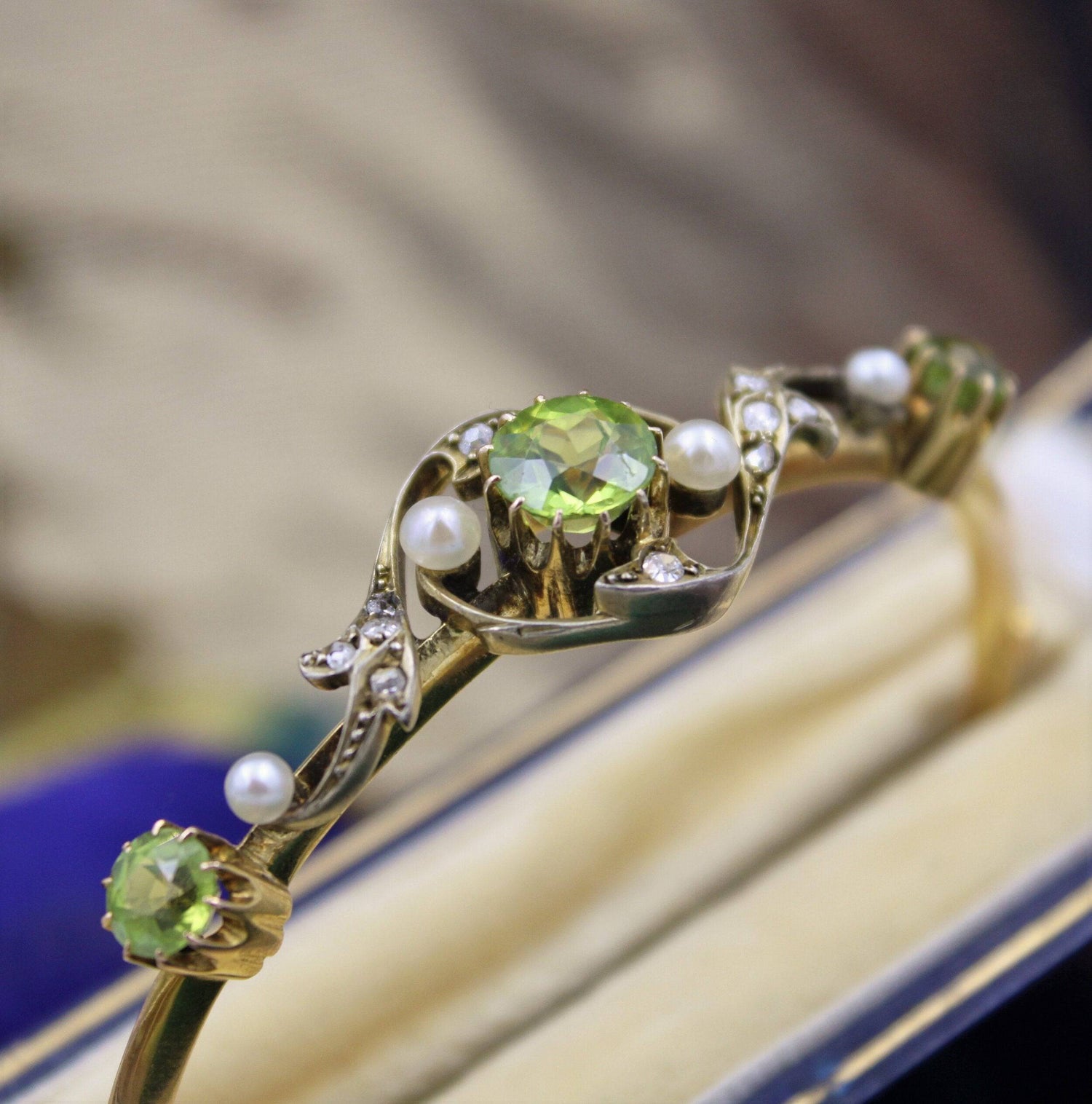 A very fine Peridot, Diamond and Natural Pearl Bangle mounted in 15ct Yellow Gold, English, Circa 1905 - Robin Haydock Antiques