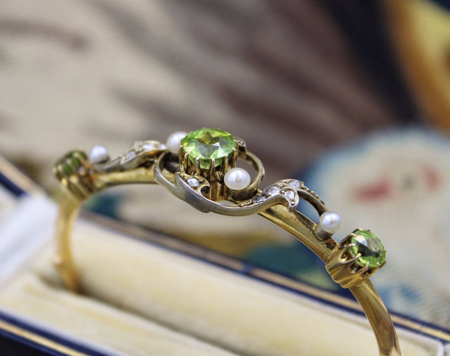 A very fine Peridot, Diamond and Natural Pearl Bangle mounted in 15ct Yellow Gold, English, Circa 1905 - Robin Haydock Antiques